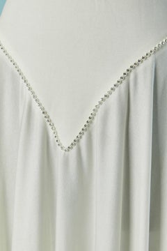 Soirée blanche dos nu  robe en jersey ornée de strass LORIS AZZARO