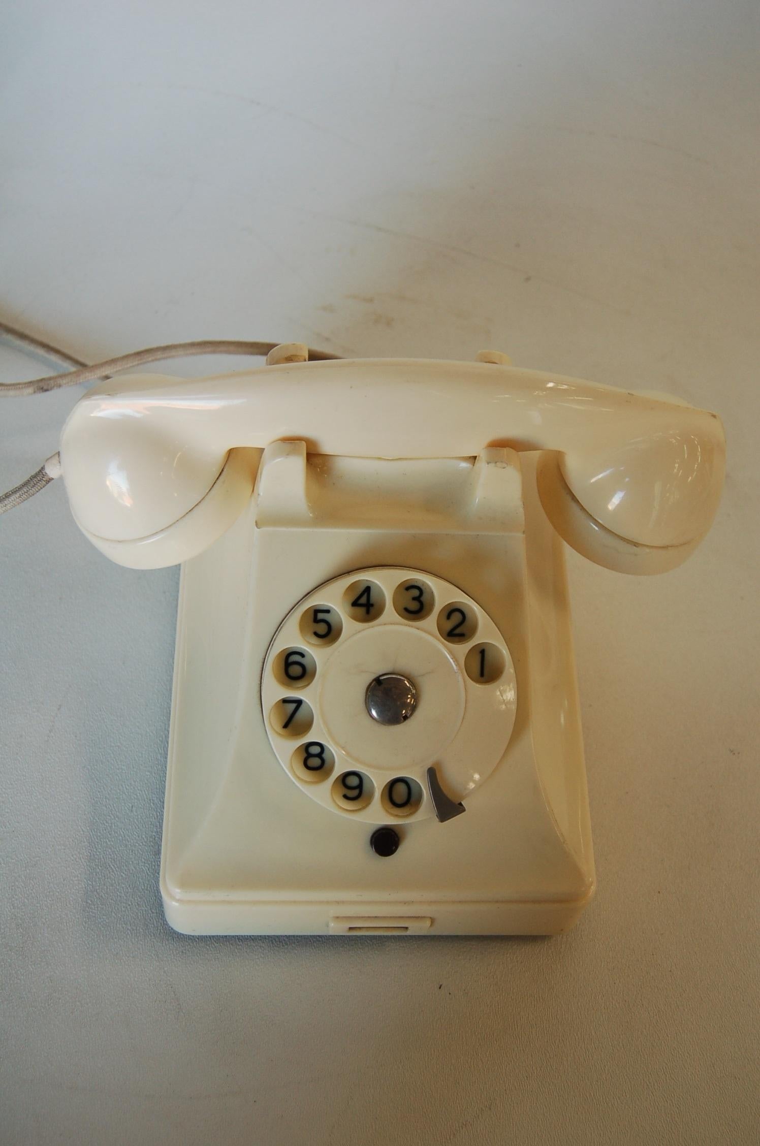 white bakelite telephone