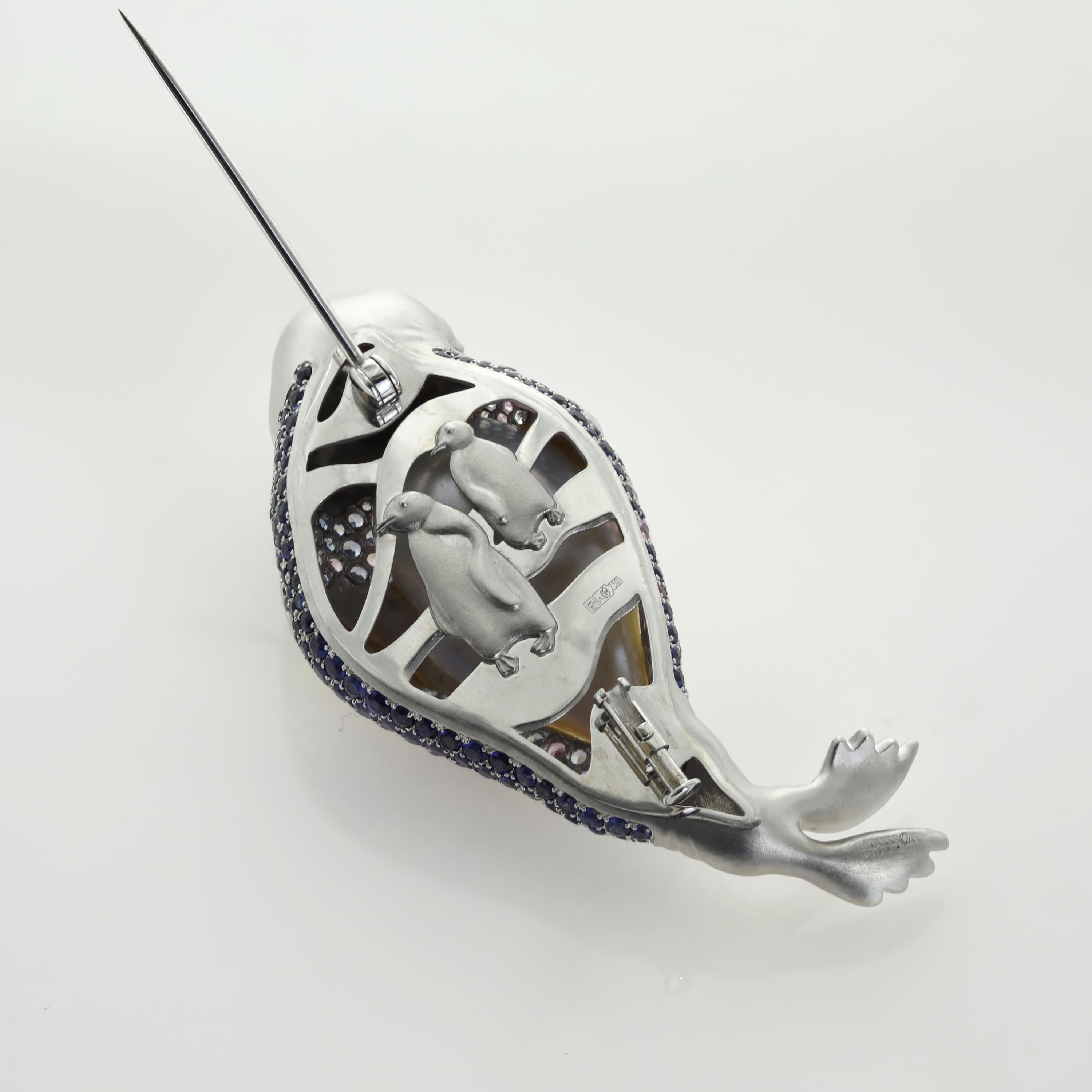 White Baroque Pearl 25 mm, Diamond Sapphires 18 Karat White Gold Walrus Brooch
High Detailing. On the back part funny friends of our Walrus - the Couple of Penguins.

28.1x63.3x19.6 mm
29.69 gm