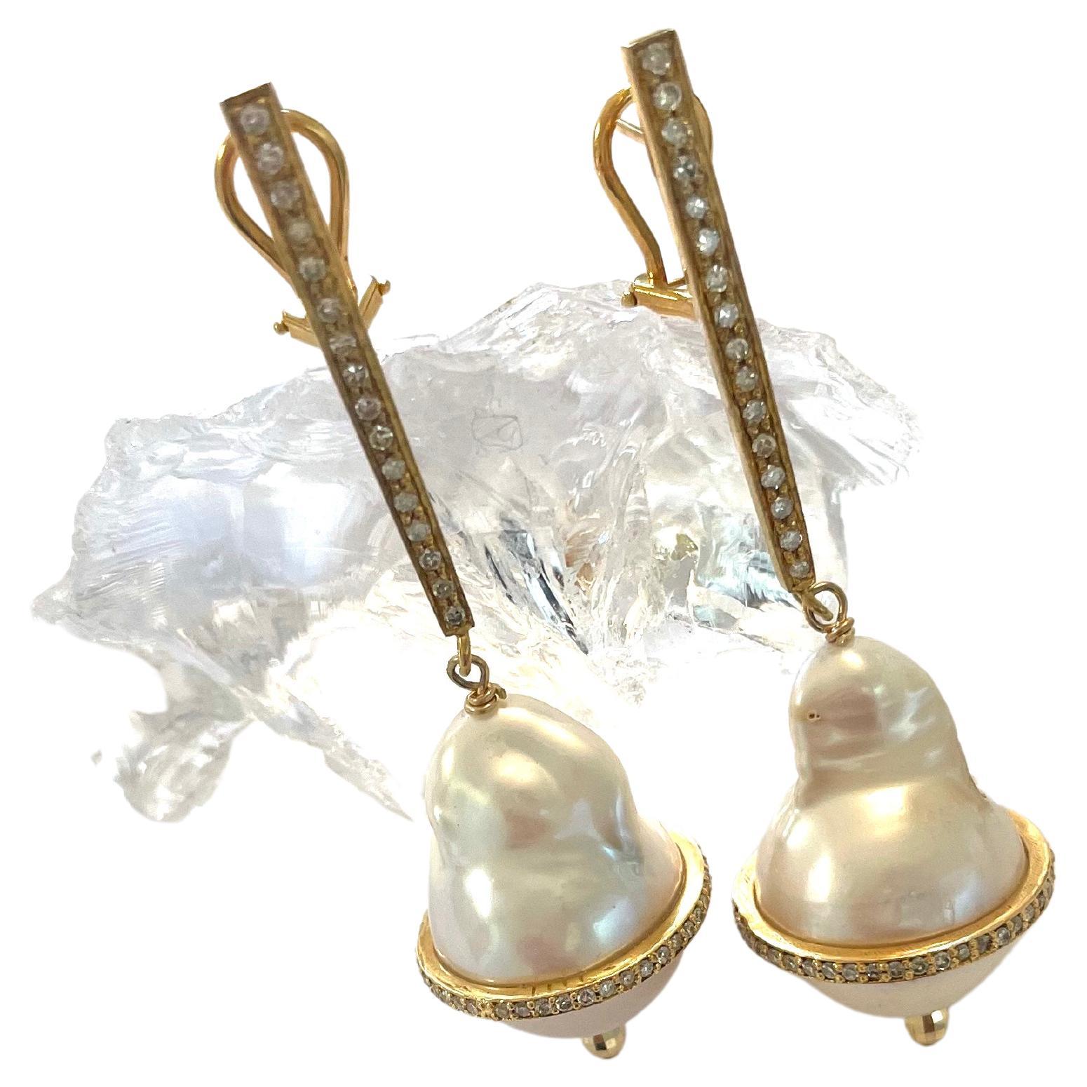 Description
White baroque freshwater pearl with diamonds Vermeil earrings
Item # E3278. 
Check out matching necklace: 