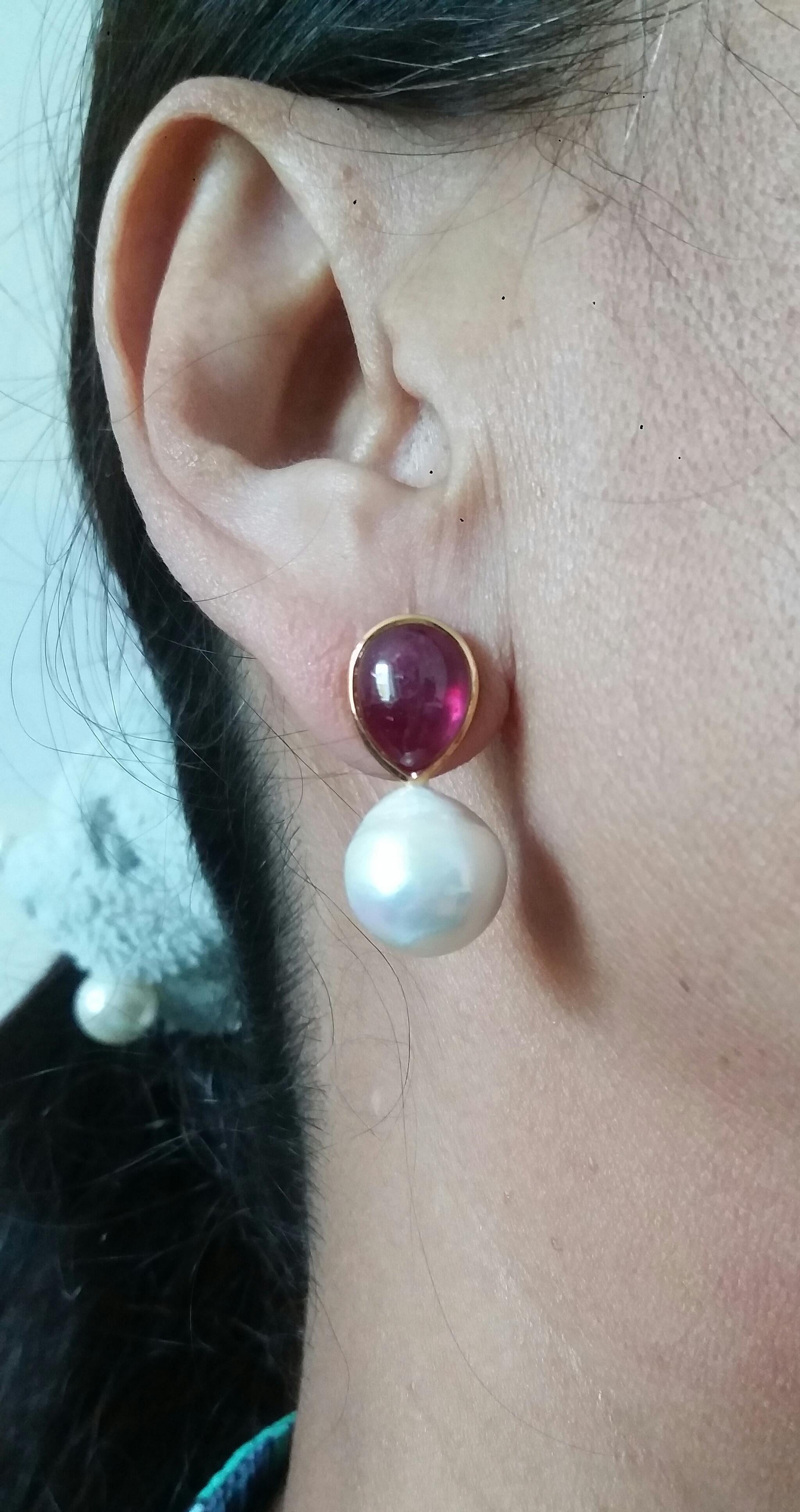 Contemporary White Baroque Pearls Pear Shape Ruby Cabs 14 Kt Yellow Gold Bezel Stud Earrings For Sale