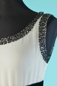 White beaded chiffon cocktail dress with black velvet belt and bow Bill Blass