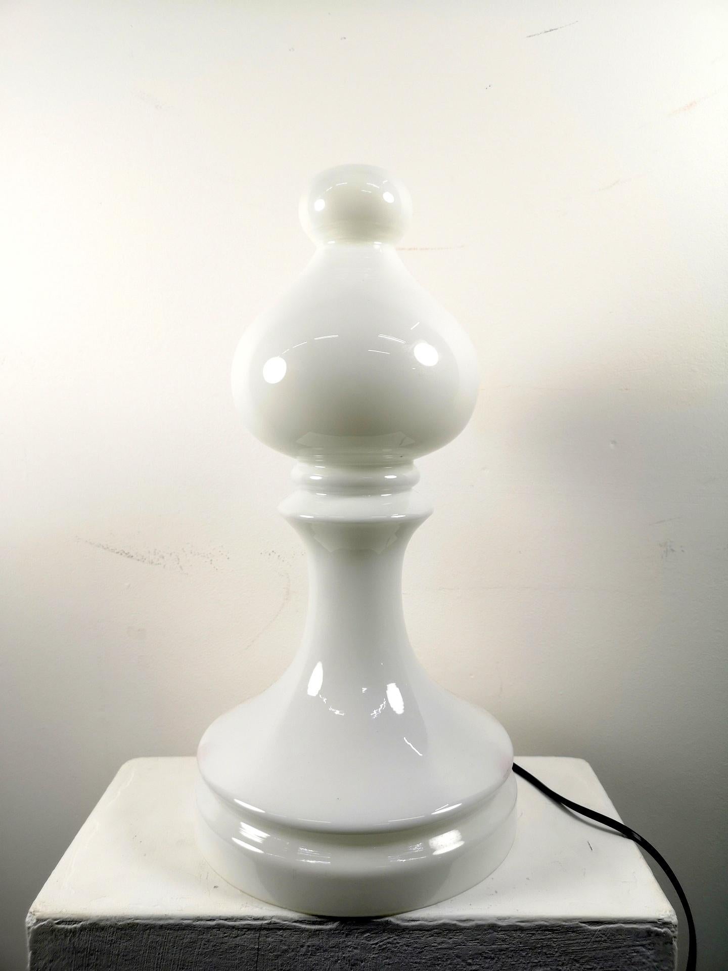 A beautiful and decorative table or side lamp in the shape of a Bishop chess piece. Designed by Ivan Jakes, made of clear and white opal glass. 

The chess figures lamps collection was designed by Ivan Jakeš (Czech sculptor, painter, master