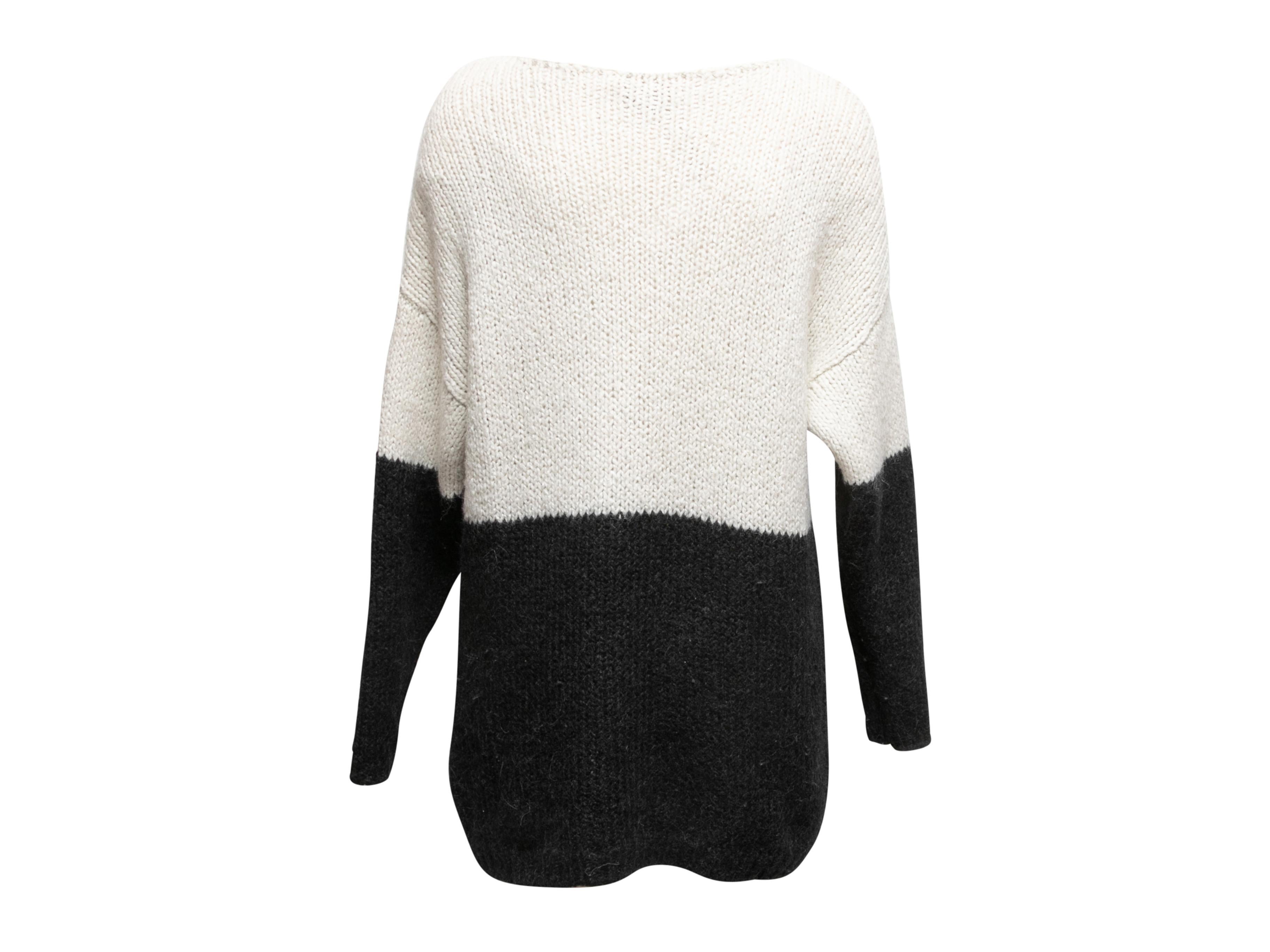 White and black alpaca and silk-blend color block sweater by Alice + Olivia. Bateau neckline. 38