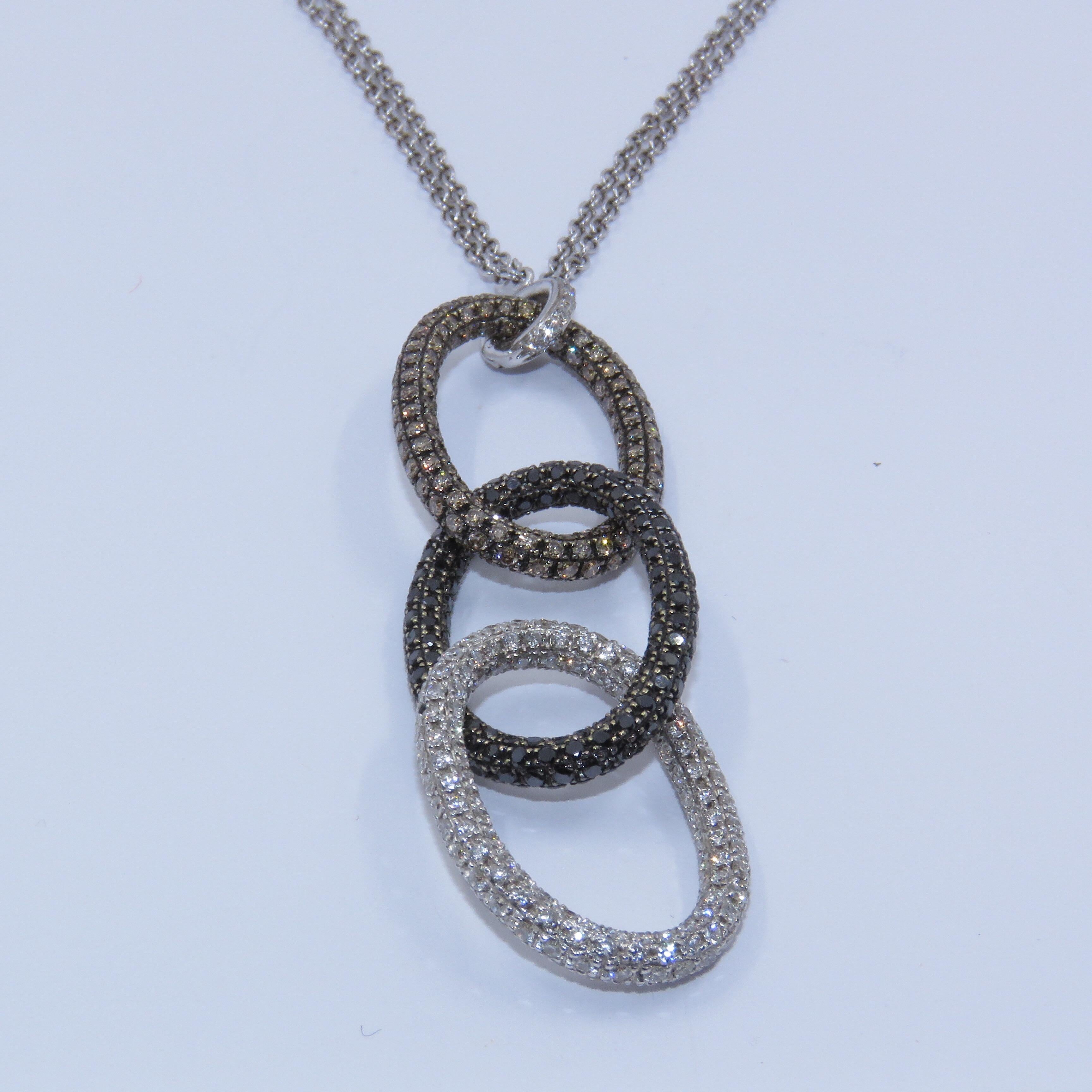 White, Black and Brown diamond necklace, set in 18Kt White Gold 
Diamond weight 2.43 carats
18 Kt White Gold double chain is detachable with a diamond hook, versatile to take a different enhancer or pendant.