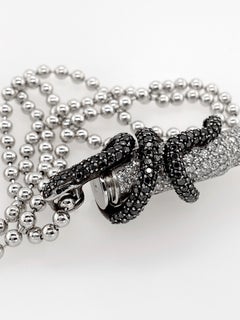 White and Black Diamond Snake Bullet Pendant