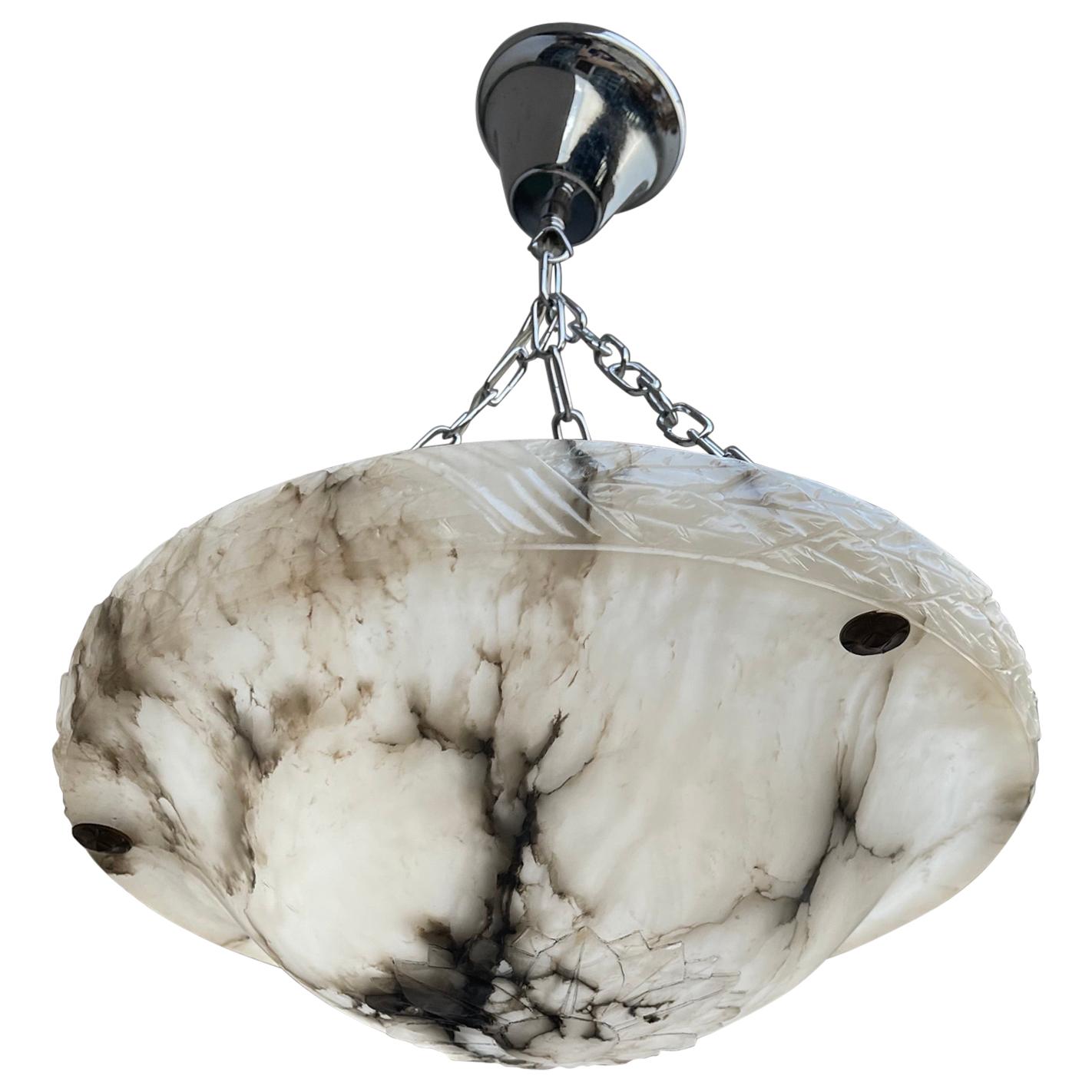 Another beautifully designed, all handcrafted and excellent condition alabaster pendant with metal chain

This practical size alabaster shade pendant really ticks all the boxes. Firstly, the shape of this hand carved alabaster shade is the perfect