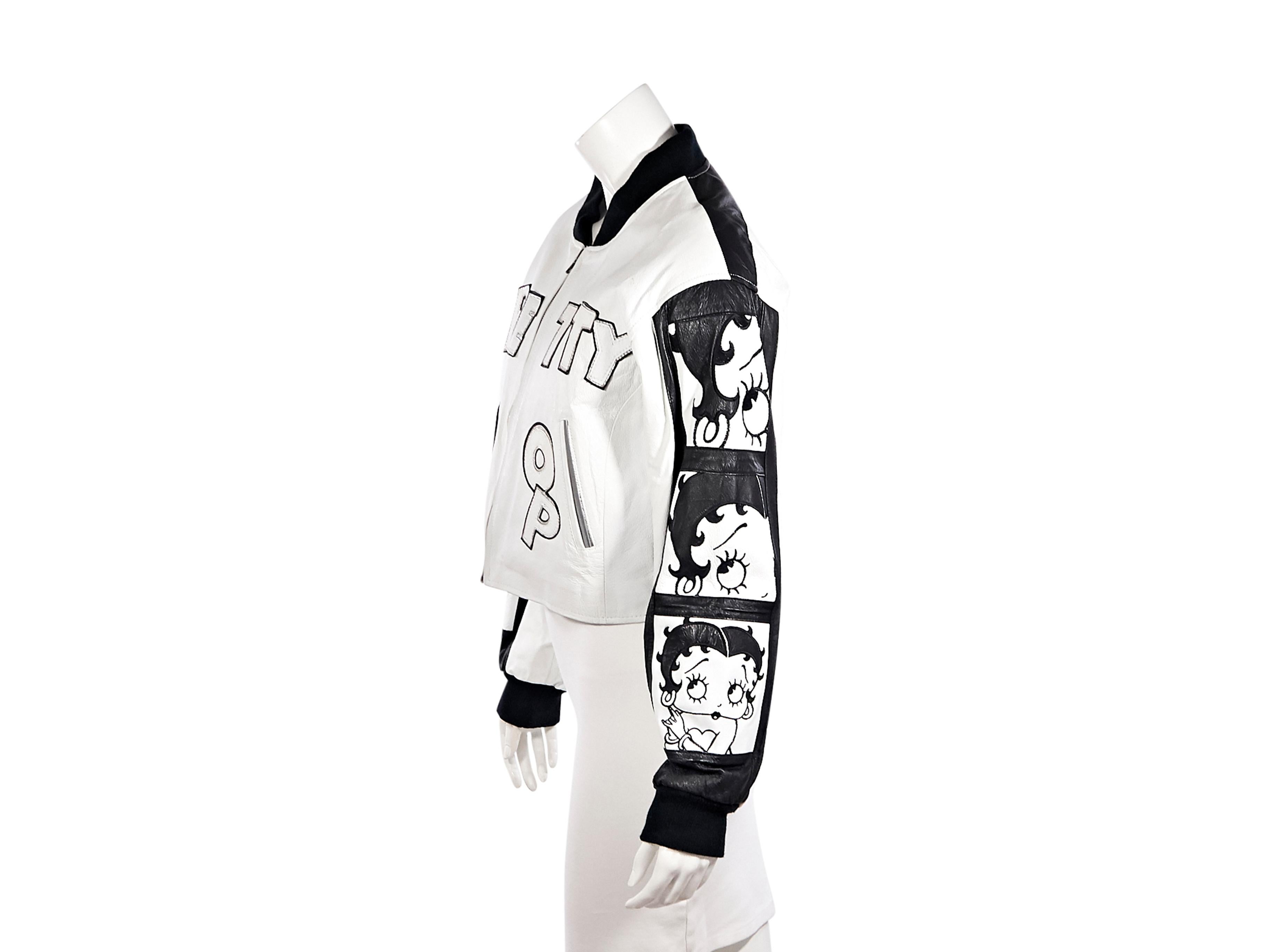 Product details:  Vintage white and black Betty Boop cropped leather jacket by Montana Toons.  Stand collar.  Long sleeves.  Zip-front closure.  Waist slide pockets.  34