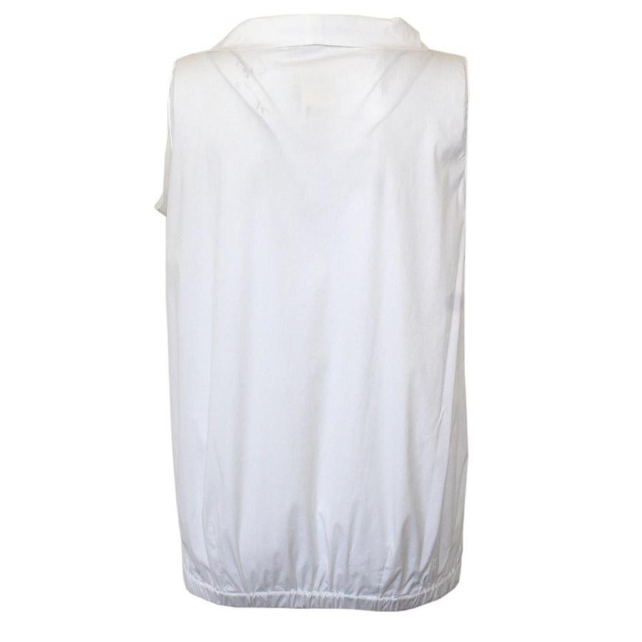 Cotton White color Sleeveless Central bow Lenght from shoulder cm 62 (24.4 inches)
