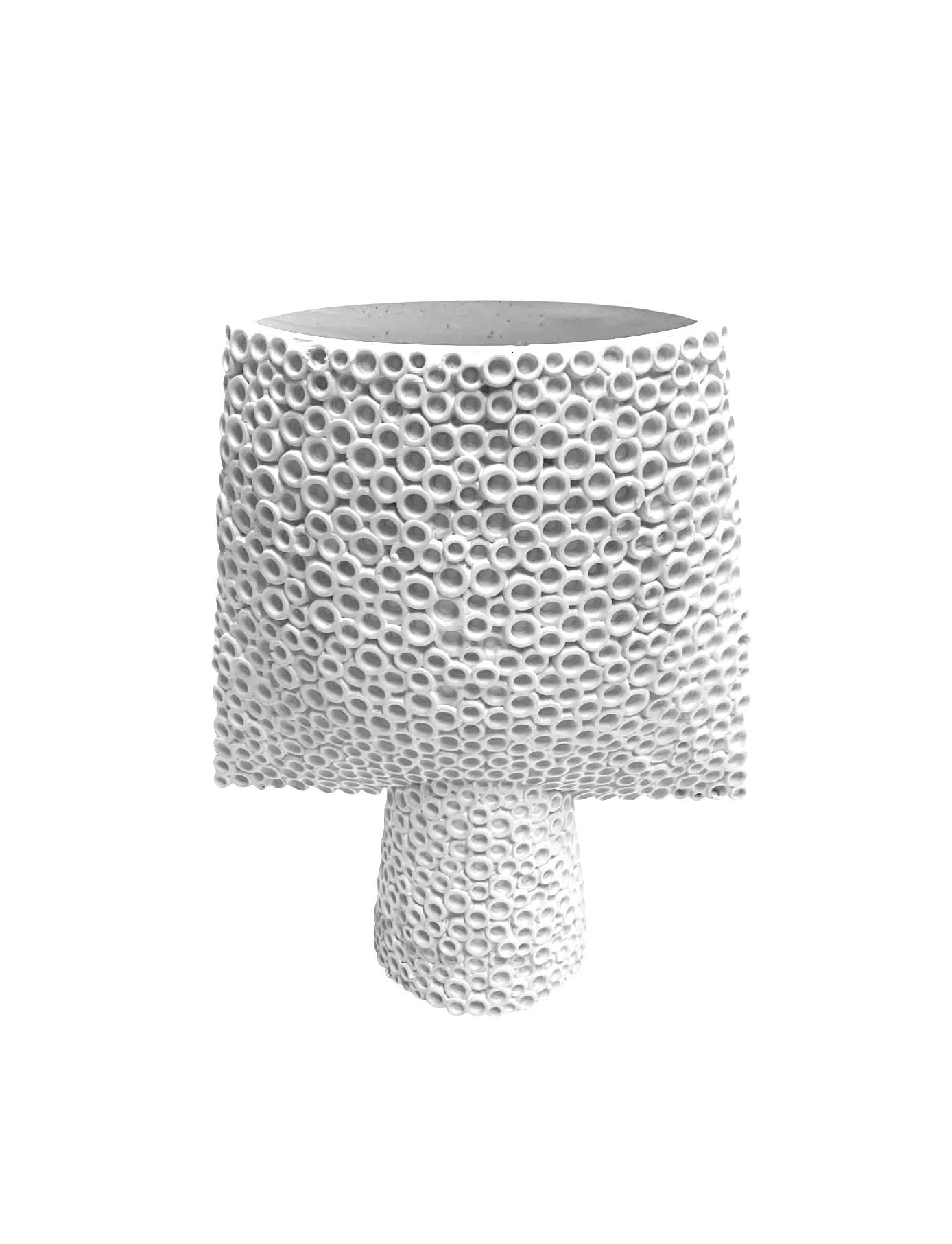 Contemporary Danish designed bone white arrow shaped vase.
Bold surface texture.
Part of a very large collection.