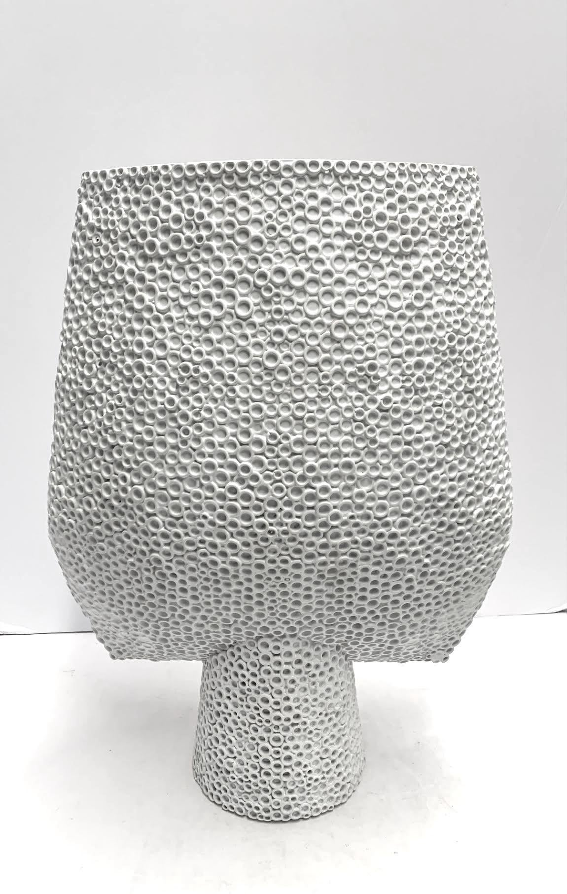 Contemporary Danish designed bone white large arrow shaped vase.
Bold surface texture.
Part of a very large collection.