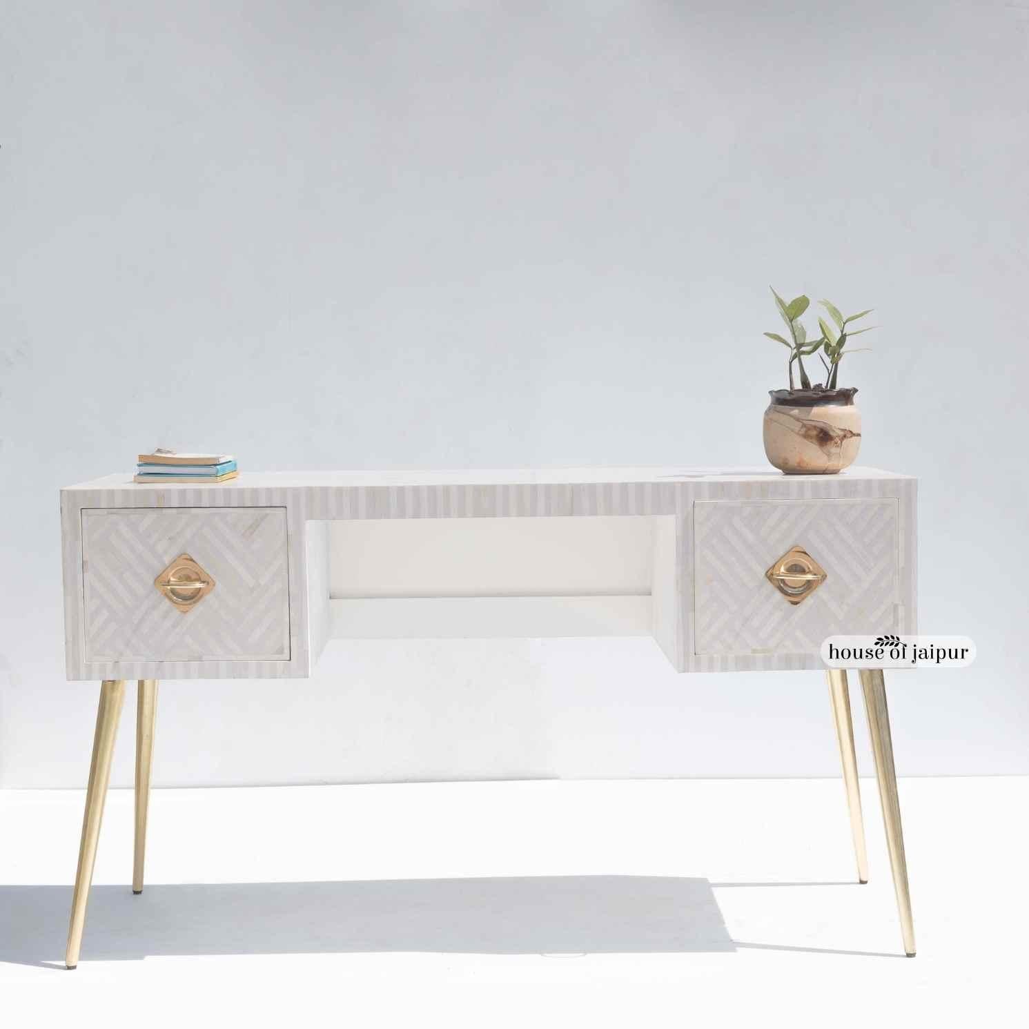Our Bone Inlay Work Desk is a timeless addition to any study, vanity or work-from-home space. This elegant piece features a subtle white-on-white geometric tessellation pattern, created by hand-cut bone fragments that are intricately arranged by our