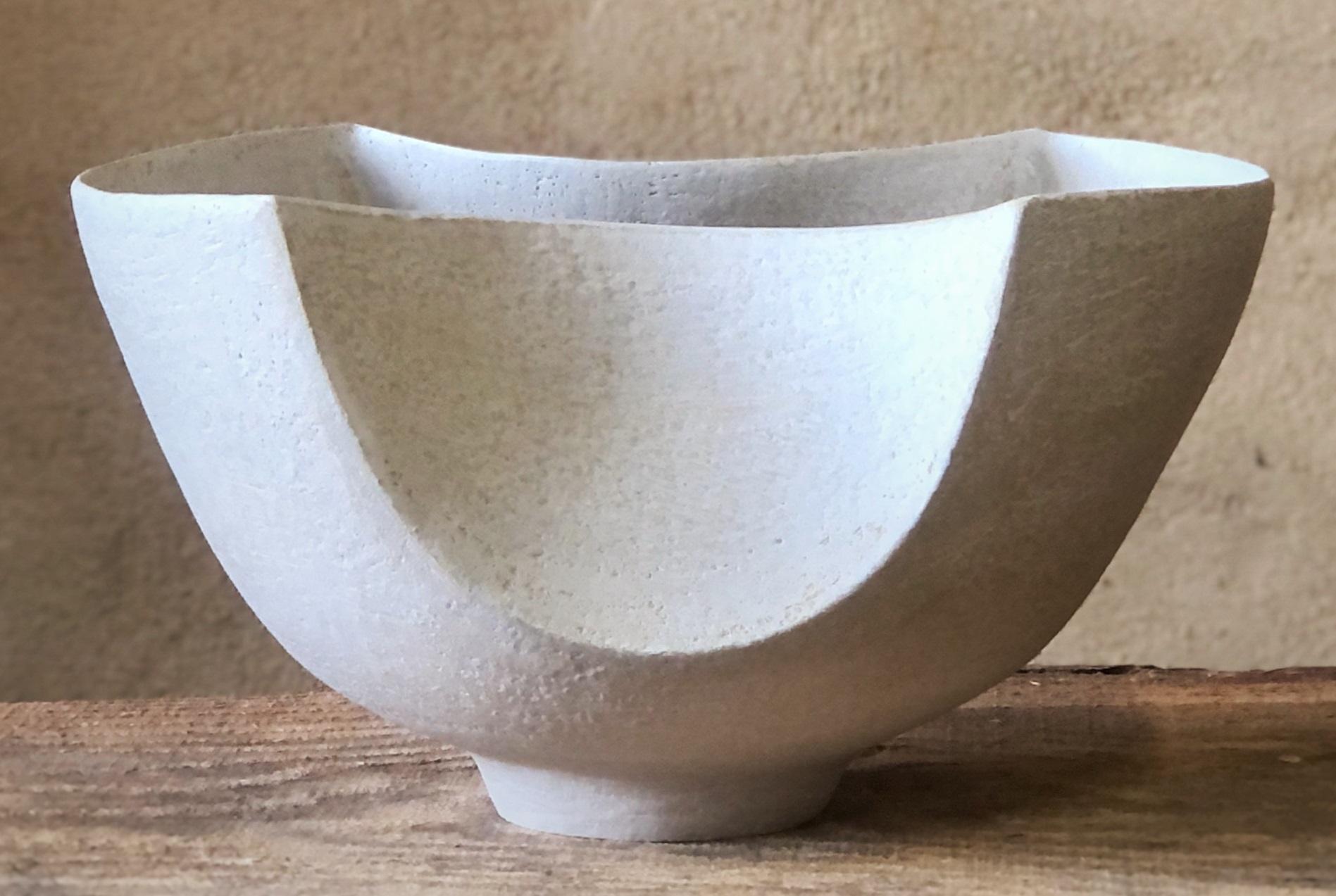 White Bowl by Sophie Vaidie
One Of A Kind.
Dimensions: D 20,5 x W 31 x H 16,5 cm. 
Materials: Beige chamotted stoneware and porcelain slip.

In the beginning, there was a need to make, with the hands, the touch, the senses. Then came the desire to