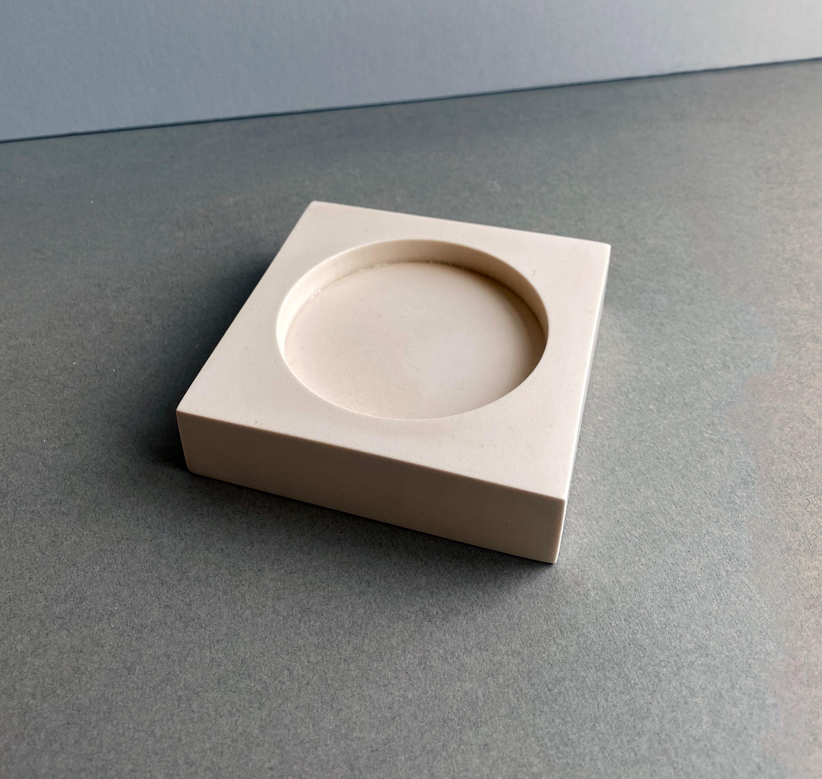 White bowl Mould Project by Theodora Alfredsdottir
Unique
Materials: Jesmonite
Dimensions: 110 x 110 x 25 mm

Theodora Alfredsdottir is a product design studio based in London. 
Theodora is an Icelandic product designer. She holds a bachelor’s
