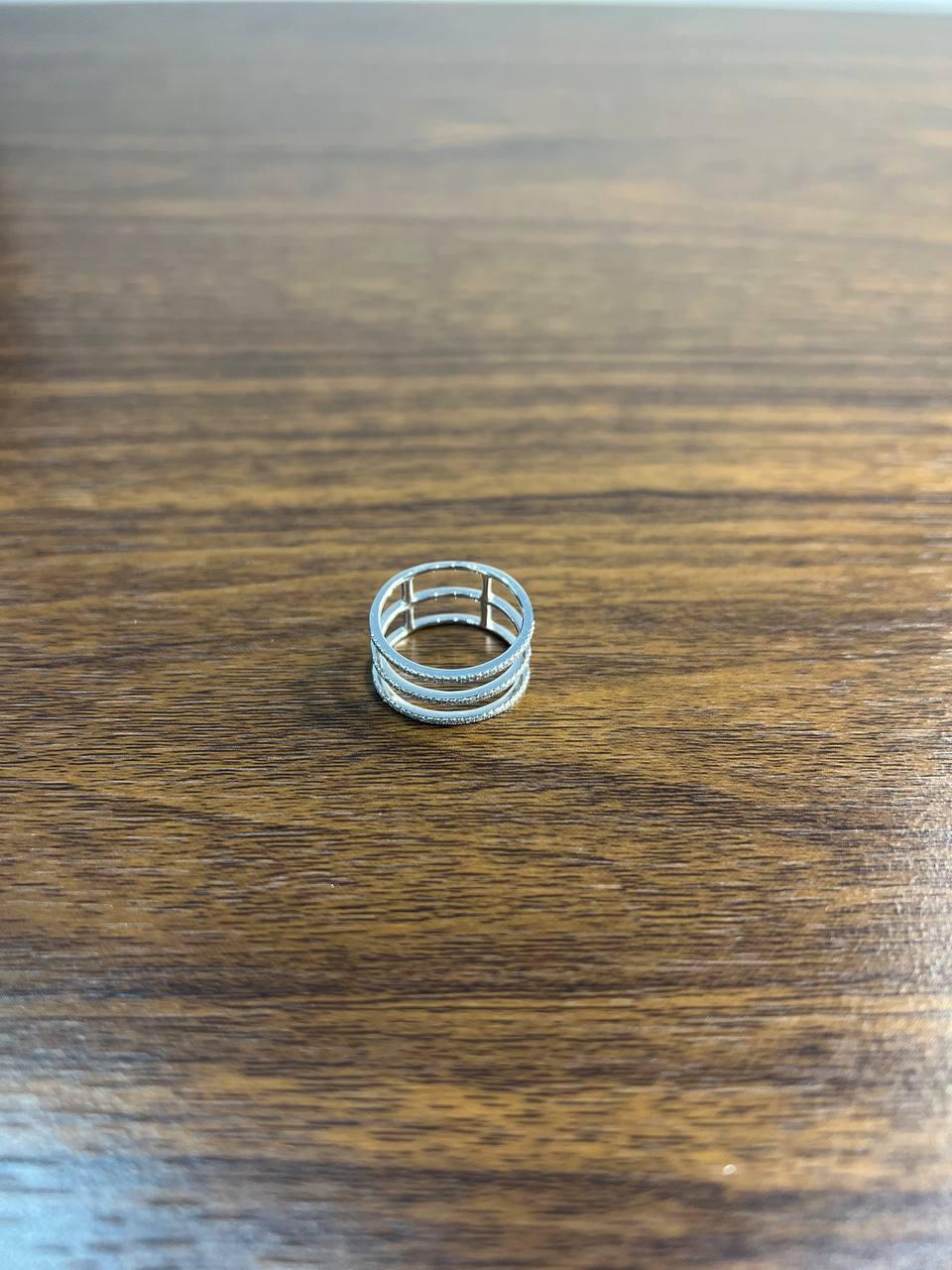 Elegant Modern 14K White Gold Multi-Band Ring, with 0.21 CTW G/VS Quality White Diamonds. This striking ring features a contemporary design with multiple parallel bands, creating a layered effect. The bands are intricately detailed with a textured
