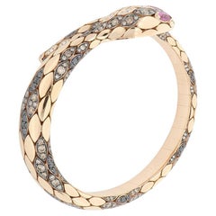 White, brown and black diamonds snake fashion bracelet with rubies
