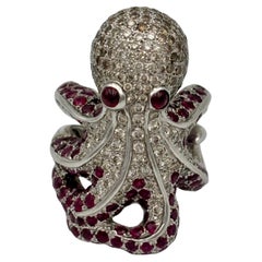 White, brown diamond and ruby octopus ring
