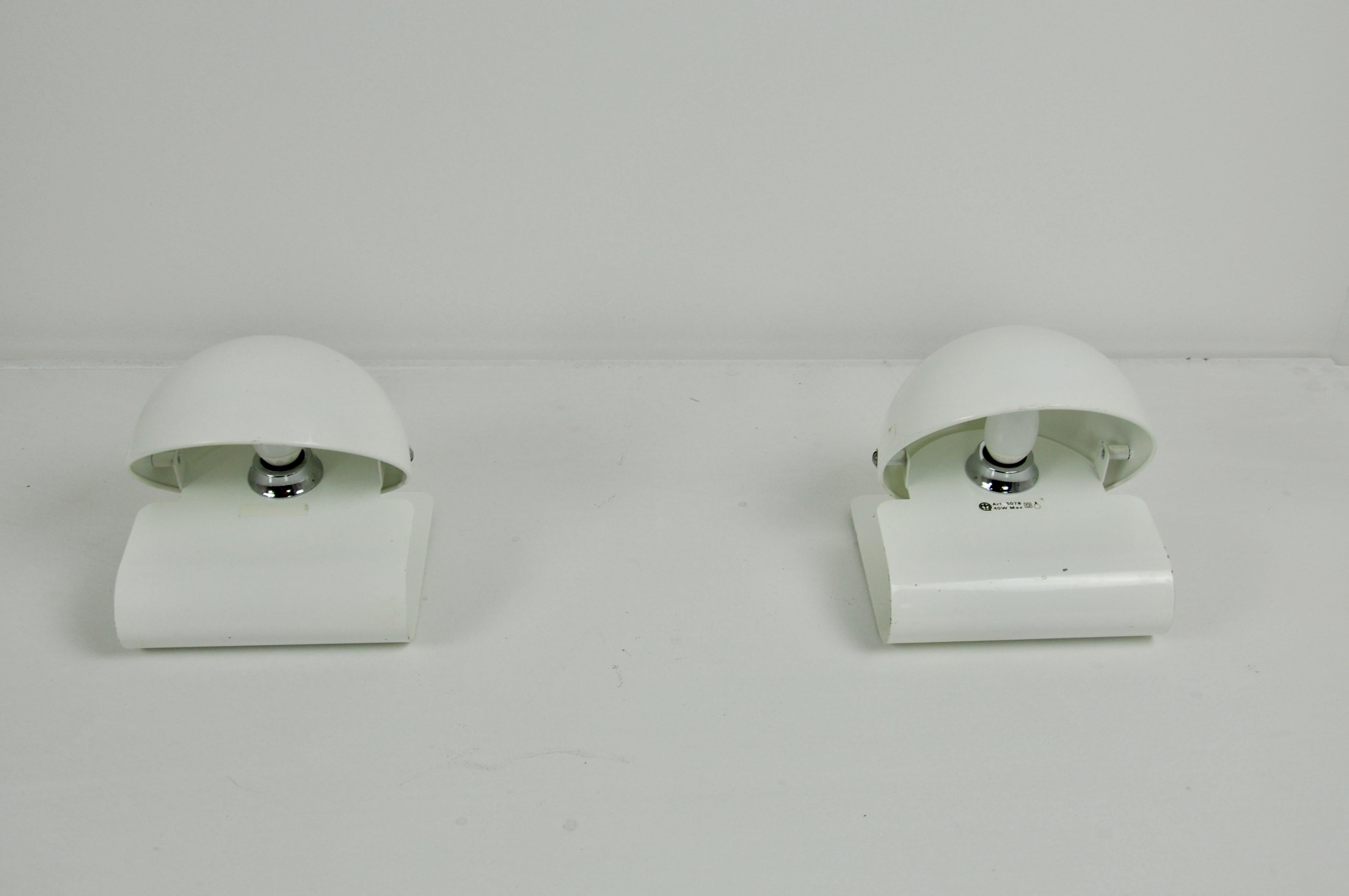Pair of metal lamp in white color. Slight wear due to time and the age of the object.
