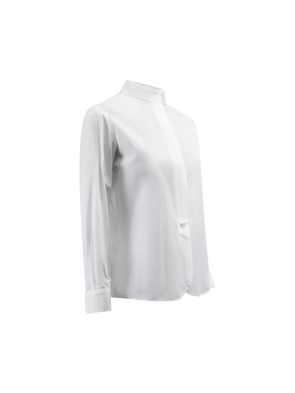 CONDITION is Never Worn. No visible wear to shirt is evident on this used Hermès designer resale item.



Details


White

Cotton

Long sleeves shirt

Front button up closure

Mock neck collared

Buttoned cuffs





Made in