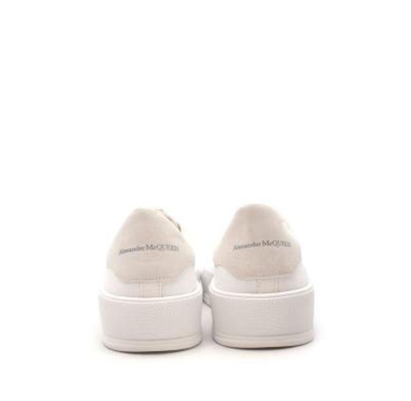 Alexander McQueen White Canvas Deck Sneakers
 

 - Low-top cotton canvas sneakers with a tonal suede heel counter
 - Chunky rubber sole and toe cap
 - Lace up
 

 Materials:
 Canvas
 Rubber
 

 PLEASE NOTE, THESE ITEMS ARE PRE-OWNED AND MAY SHOW