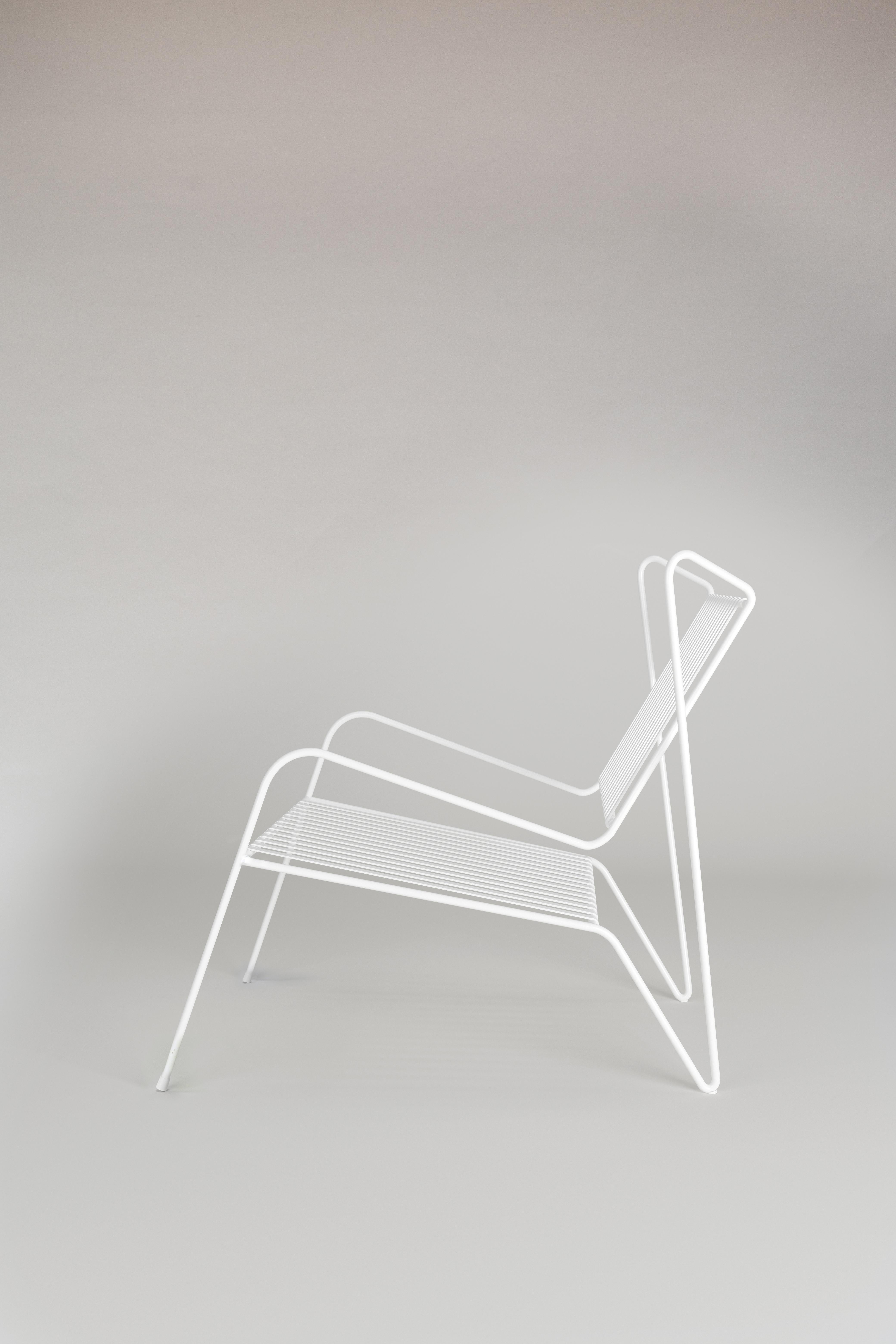 White Capri Easy Lounge chair by Cools Collection
Materials: Powder coated stainless steel.
Dimensions: W 70 x D 84 x H 78 cm (seat height 34cm).
Available in white or black finishes. 

COOLS Collection was launched in 2020 by