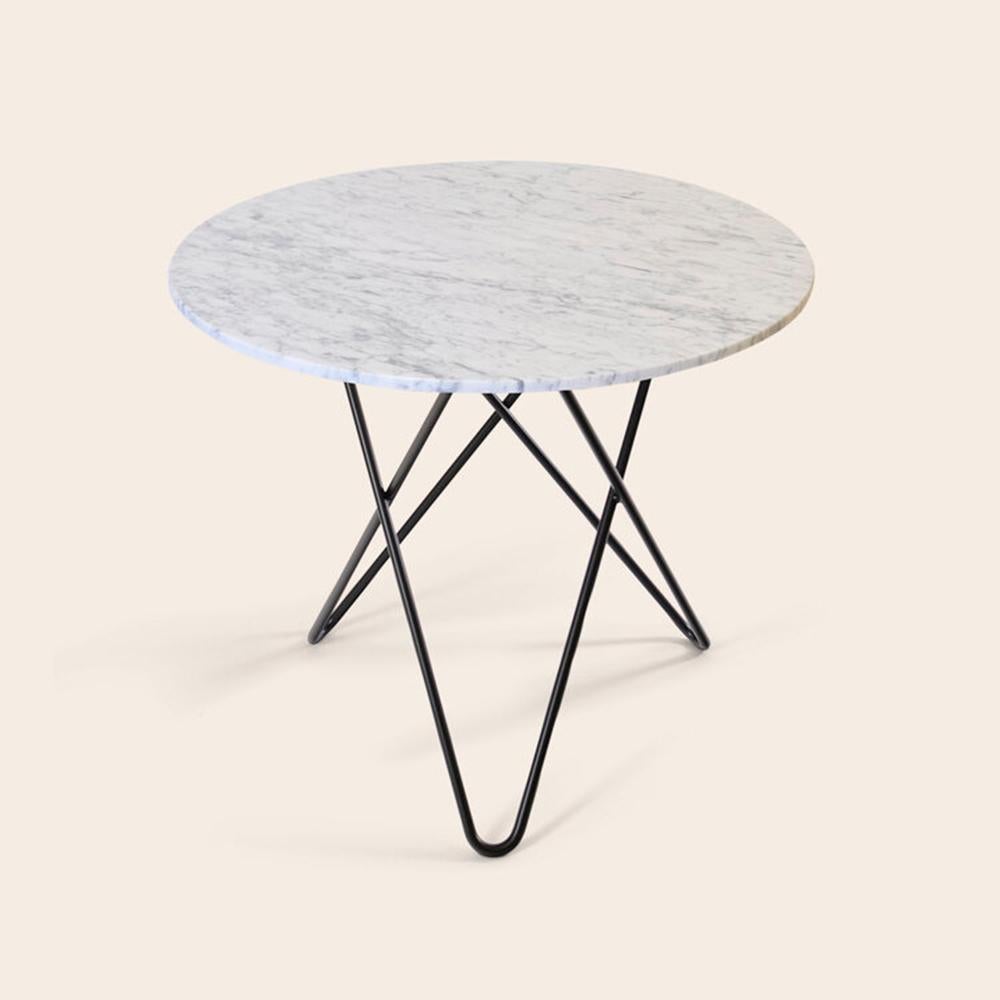 White carrara marble and black steel dining O table by Ox Denmarq
Dimensions: D 80 x H 72 cm
Materials: steel, white carrara marble
Also available: different marble and frame options available.

Ox Denmarq is a Danish design brand aspiring to