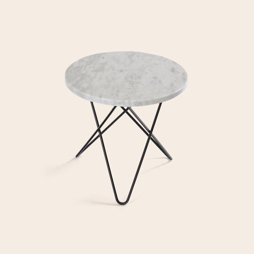 White Carrara Marble and Black Steel Mini O Table by OxDenmarq
Dimensions: D 40 x H 37 cm
Materials: Steel, White Carrara Marble
Also Available: Different top and frame options available,

OX DENMARQ is a Danish design brand aspiring to make