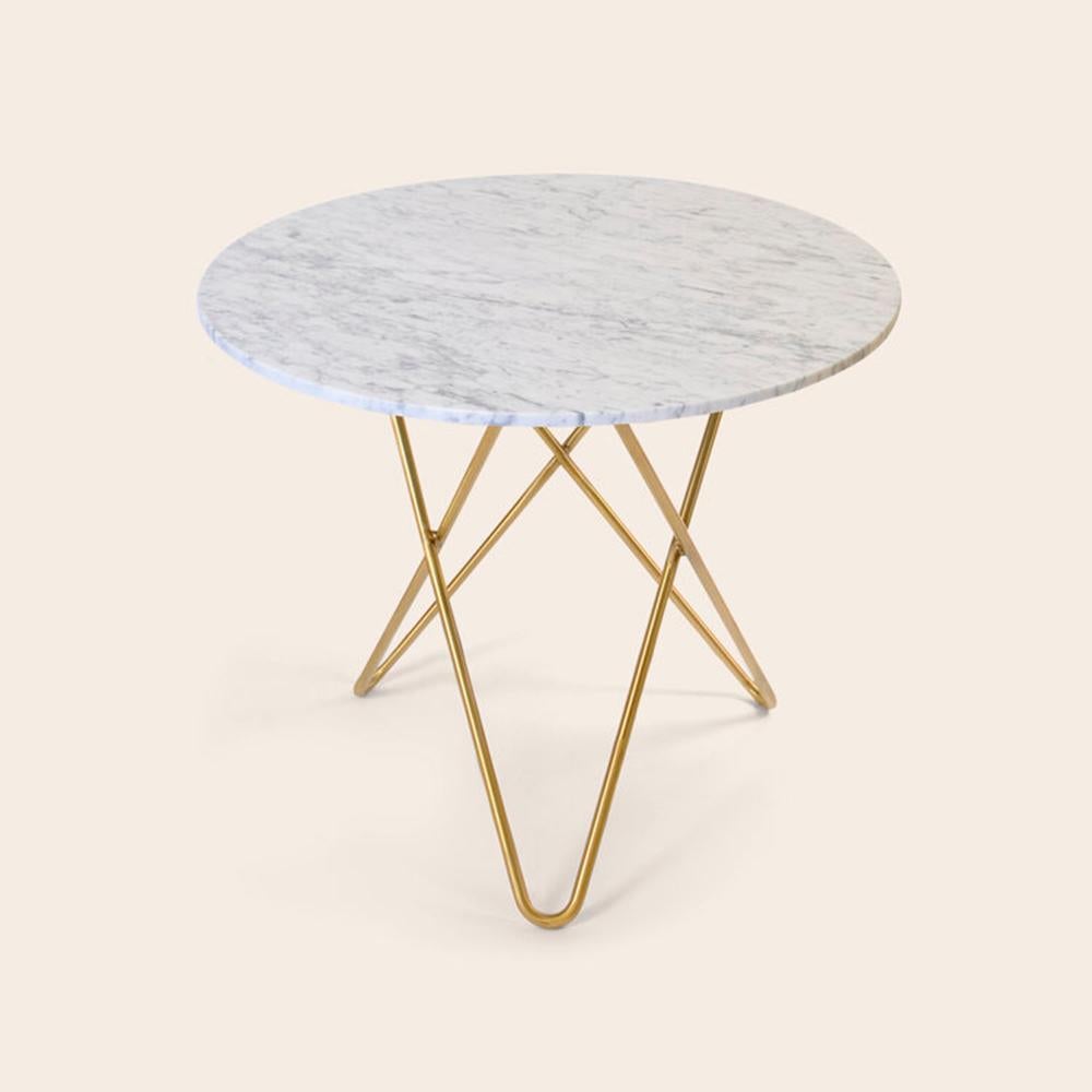 White Carrara Marble and Brass Dining O Table by OxDenmarq
Dimensions: D 80 x H 72 cm
Materials: Brass, White Carrara Marble
Also Available: Different marble and frame options available,

OX DENMARQ is a Danish design brand aspiring to make
