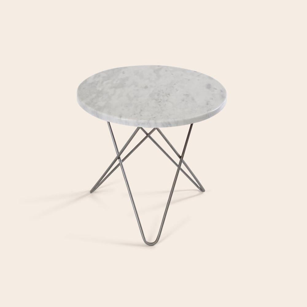 White Carrara marble and steel mini o table by OxDenmarq
Dimensions: D 40 x H 37 cm
Materials: Steel, White Carrara Marble
Also Available: Different top and frame options available.

OX DENMARQ is a Danish design brand aspiring to make