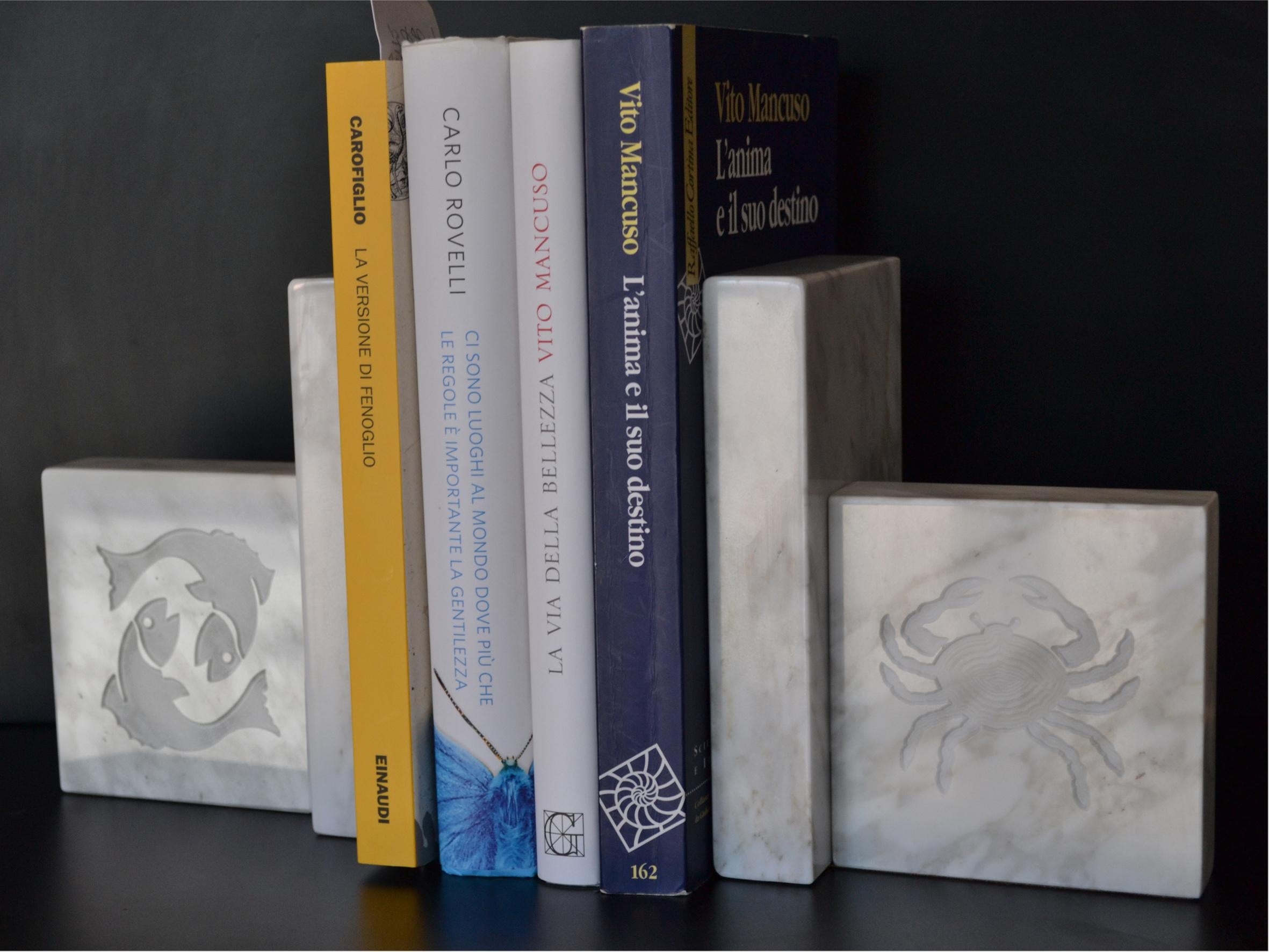Bookends manufactured in White Carrara Italian marble with inlaid zodiac signs. You can choose the combination of the two signs, see on the diagram.
weight: kilos 2.10 each one

For EU buyers this piece is subject to additional VAT tax, which