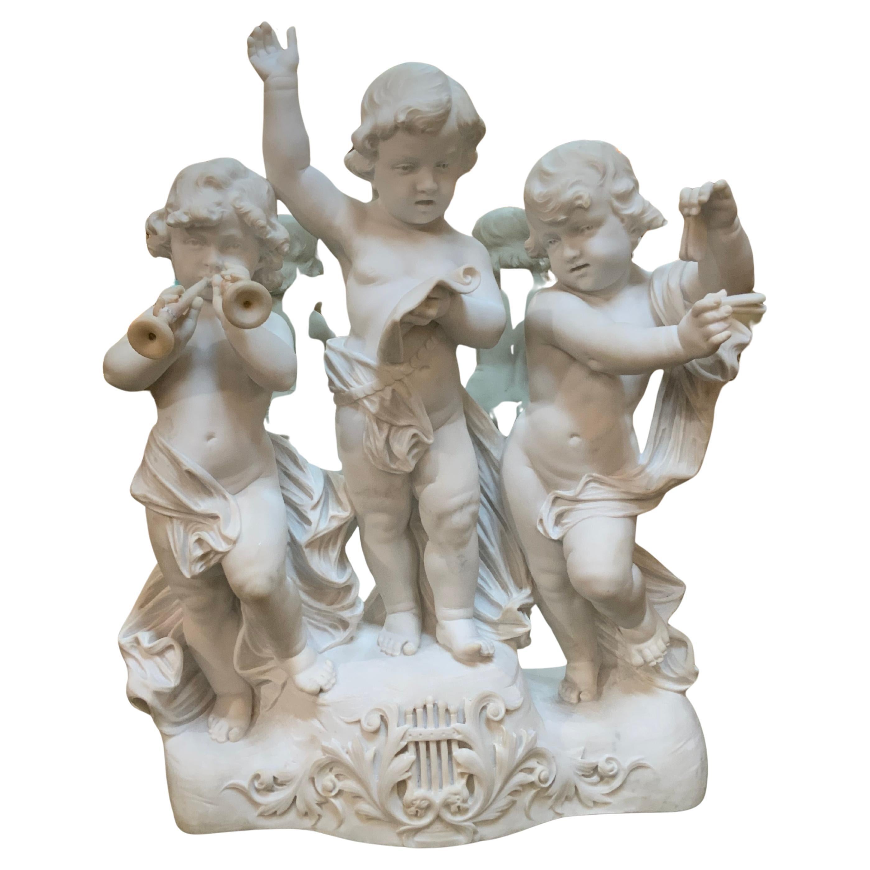 White Carrara marble statue of musical children dancing / verde marble pedestal