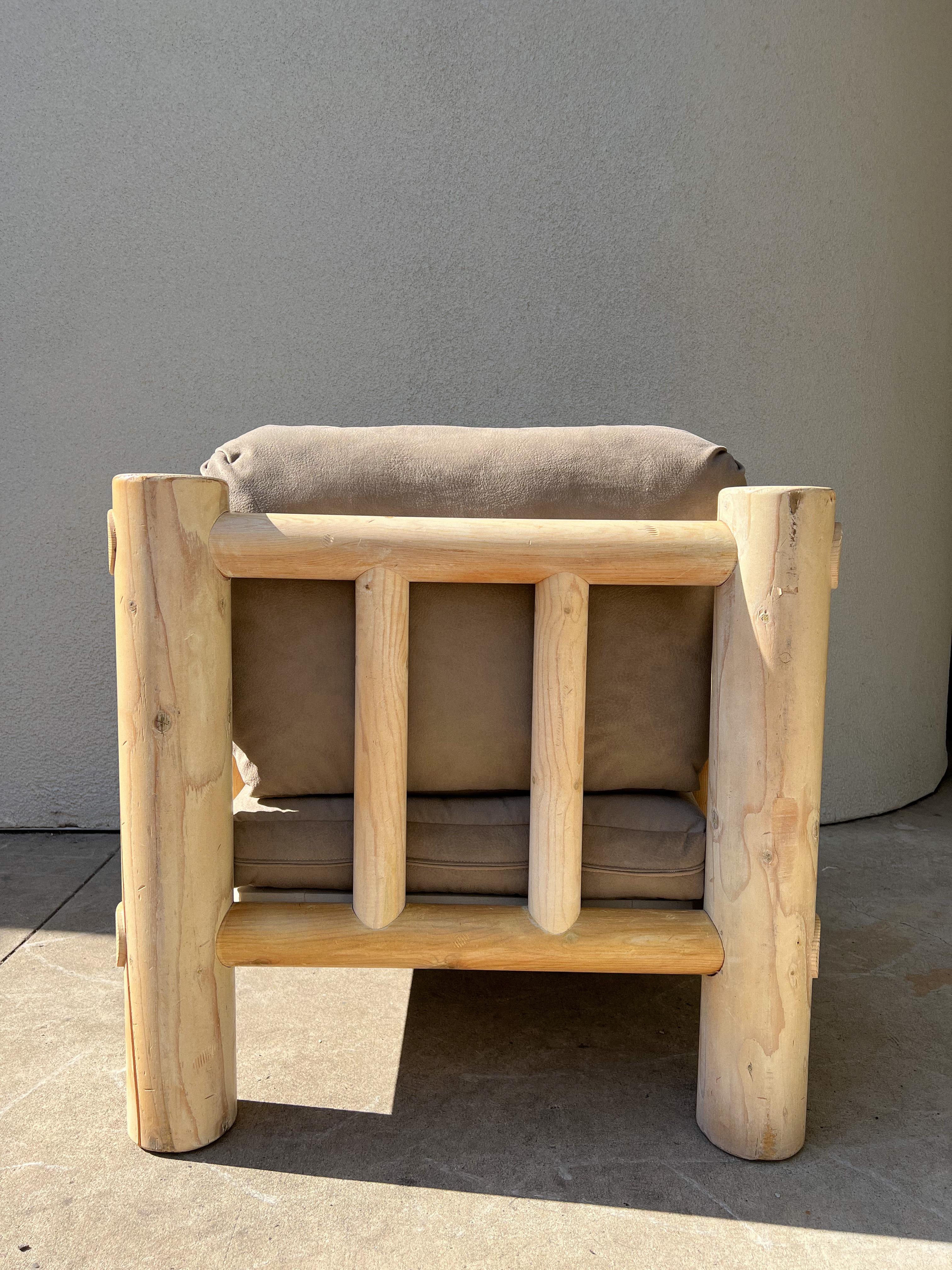 Handmade white cedar lounge chair. The frame is adorably chunky and beautifully crafted. Cushions are newly-reupholstered in an elegant gray suede. Fabric is high quality and incredibly soft. A unique piece that is both playful and insanely comfy. 