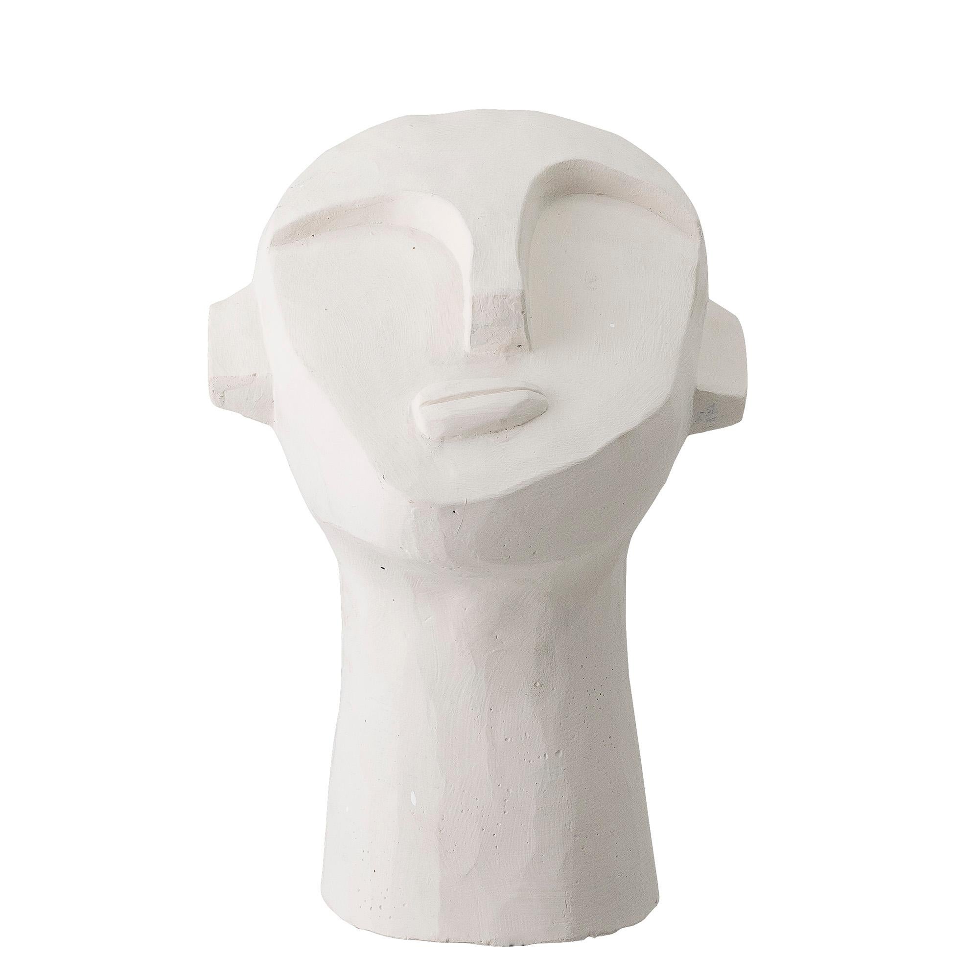 White cement cast molded Brutalist style face mask tabletop sculpture.