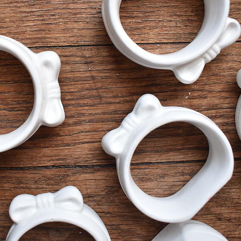 American White Ceramic Bow Motif Napkin Rings, Set of 6 For Sale