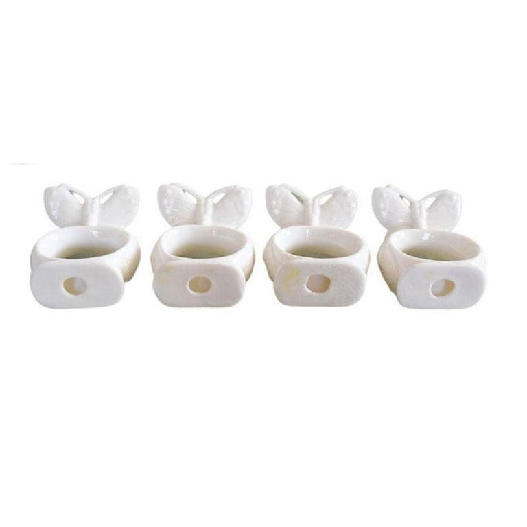 American Classical White Ceramic Butterfly Motif Napkin Rings, Set of 4 For Sale
