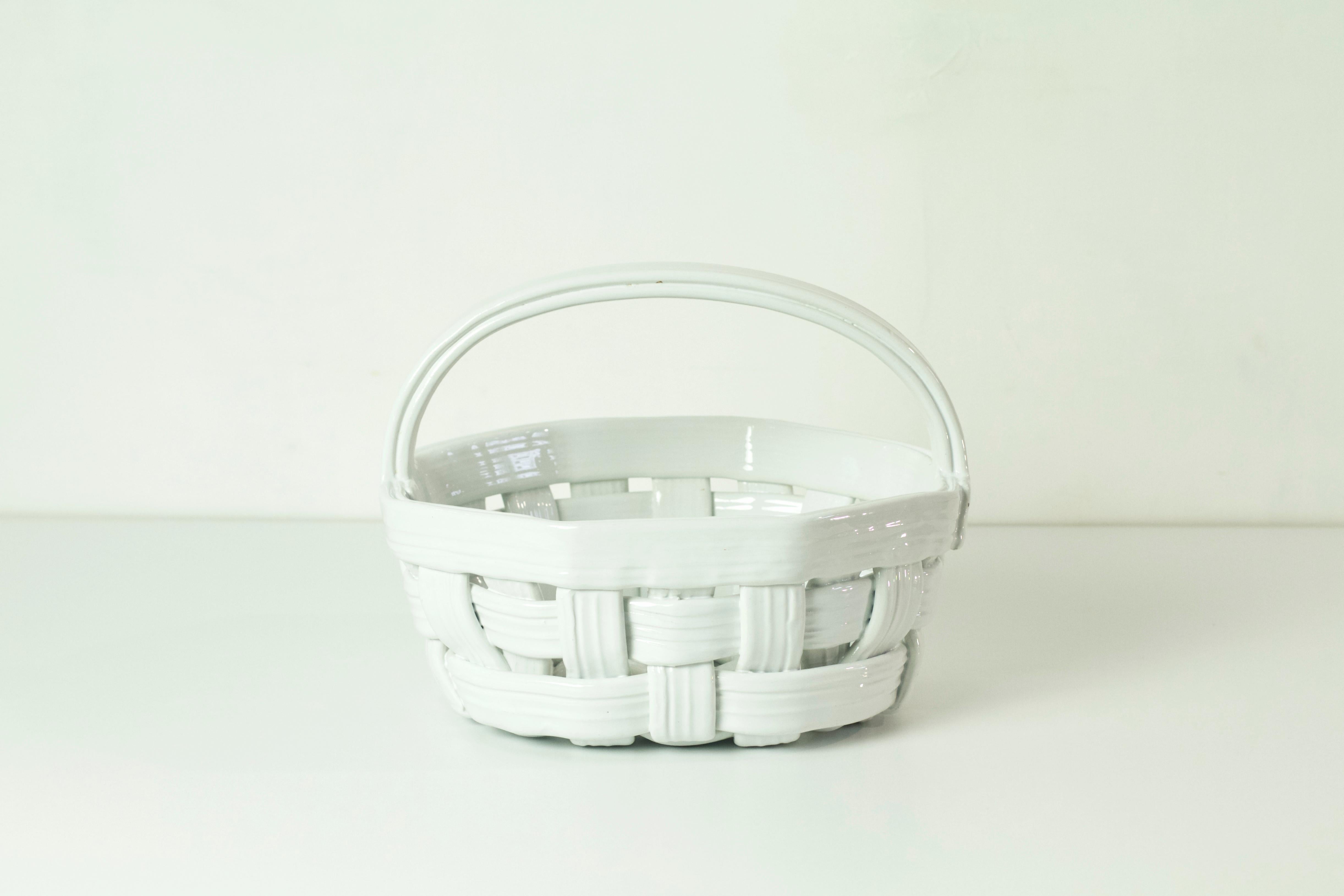 white ceramic basket with handle