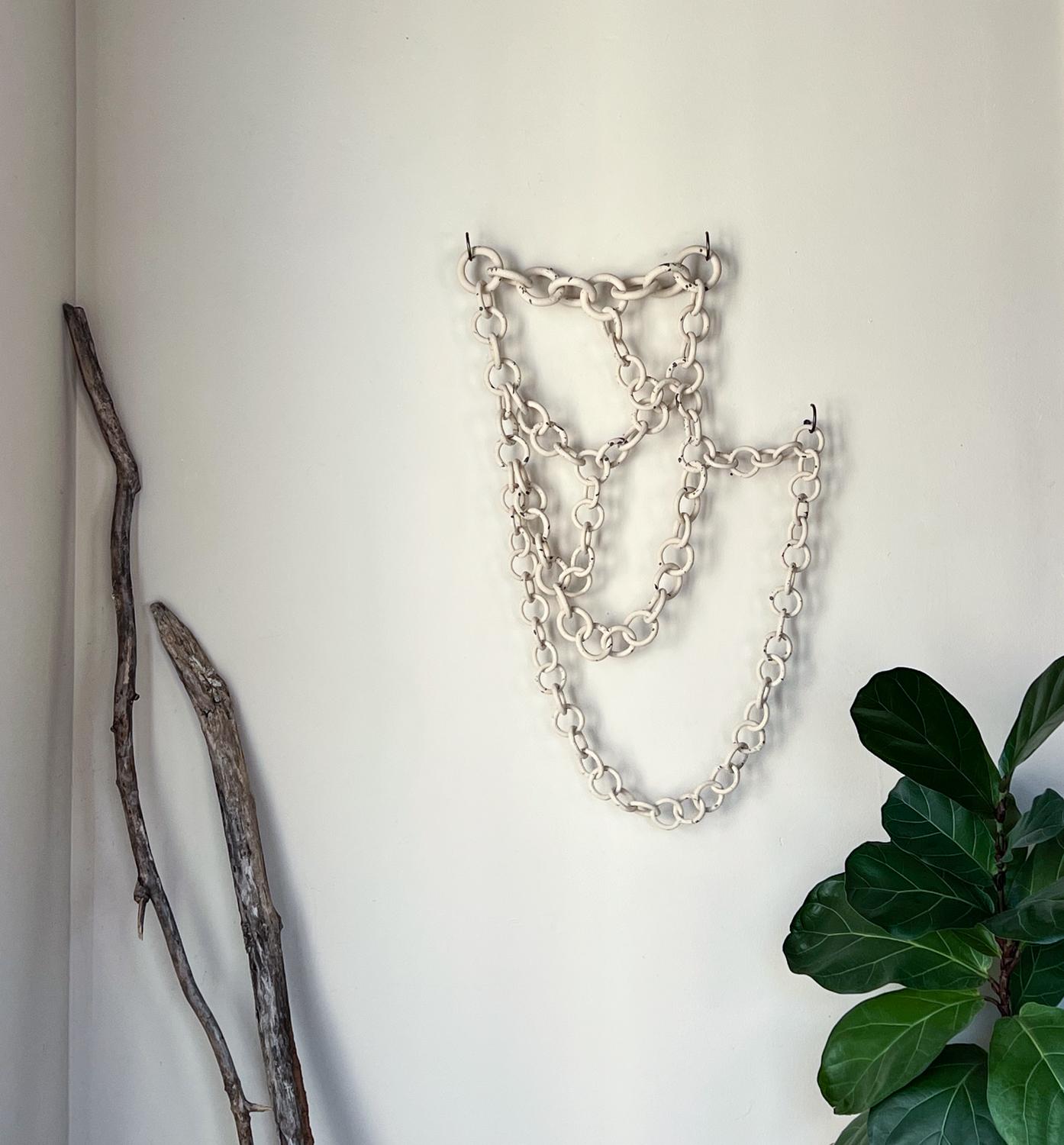 DIRECT MESSAGE ME FOR CUSTOM SIZES AND COLORS. ALL CUSTOM ORDERS TAKE 5-6 WEEKS TO SHIP.

This ceramic link chain wall hanging portrays a nomadic feel that embodies a sense of wanderlust and free-spiritedness. handbuilt from a white stoneware clay
