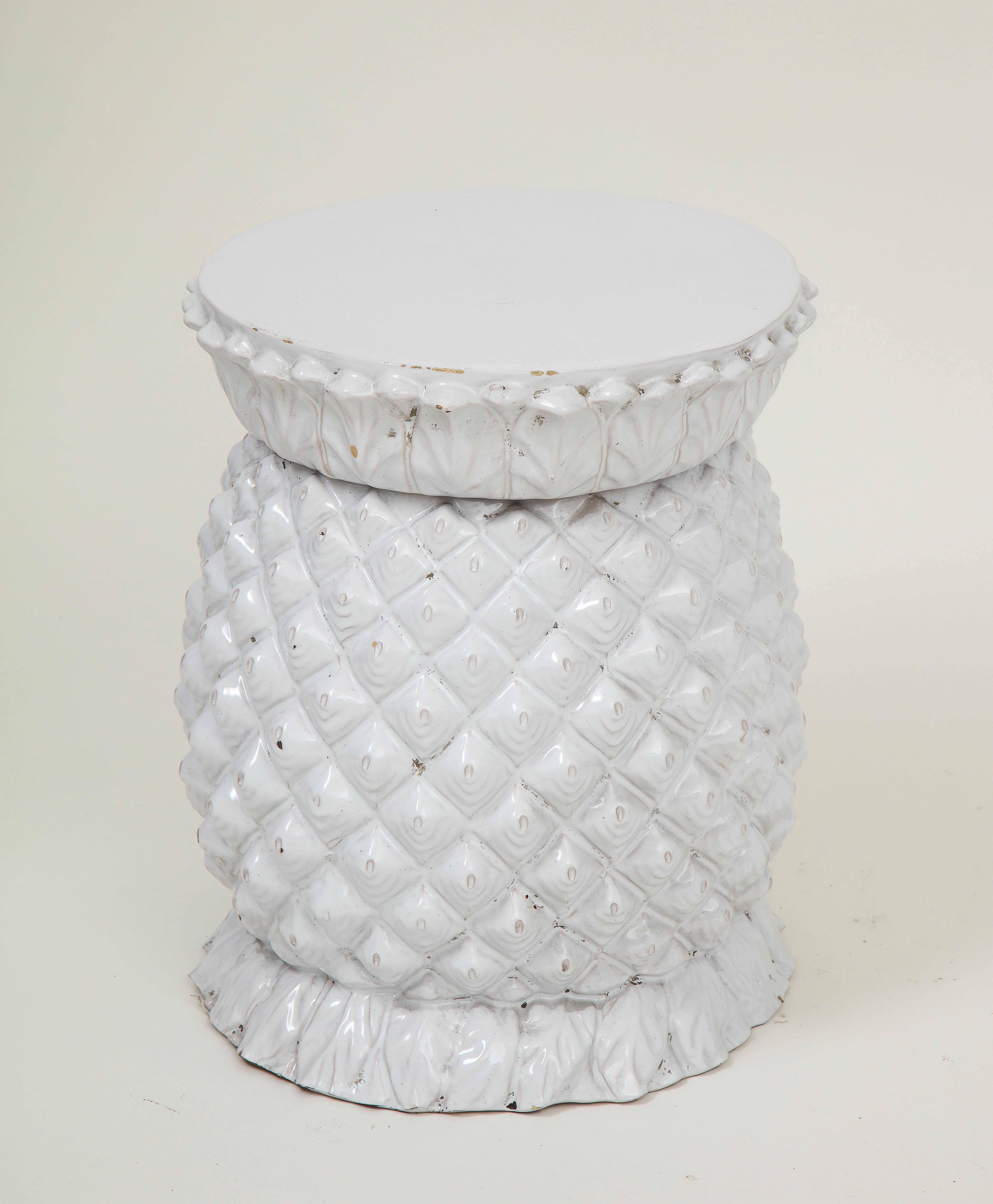 Glazed solid white; of stylized pineapple form. Possibly, 19th century.