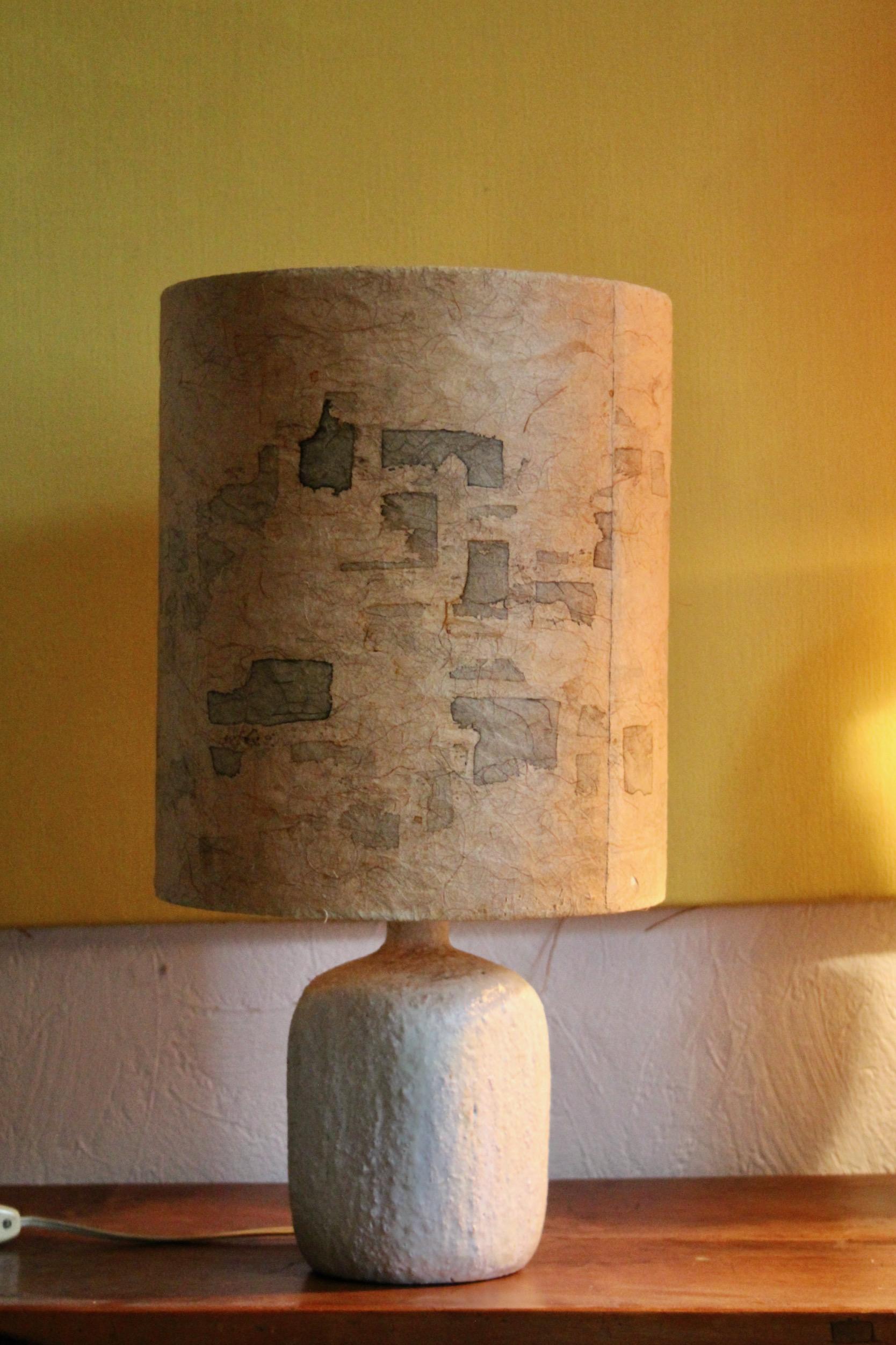 White ceramic table lamp , dimensions with out shade H 29 cm by 13 Diam