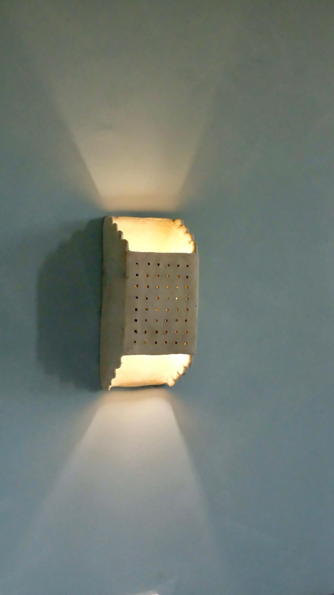 Contemporary White contemporary Ceramic Wall Light Made of local Clay, natural pigments For Sale