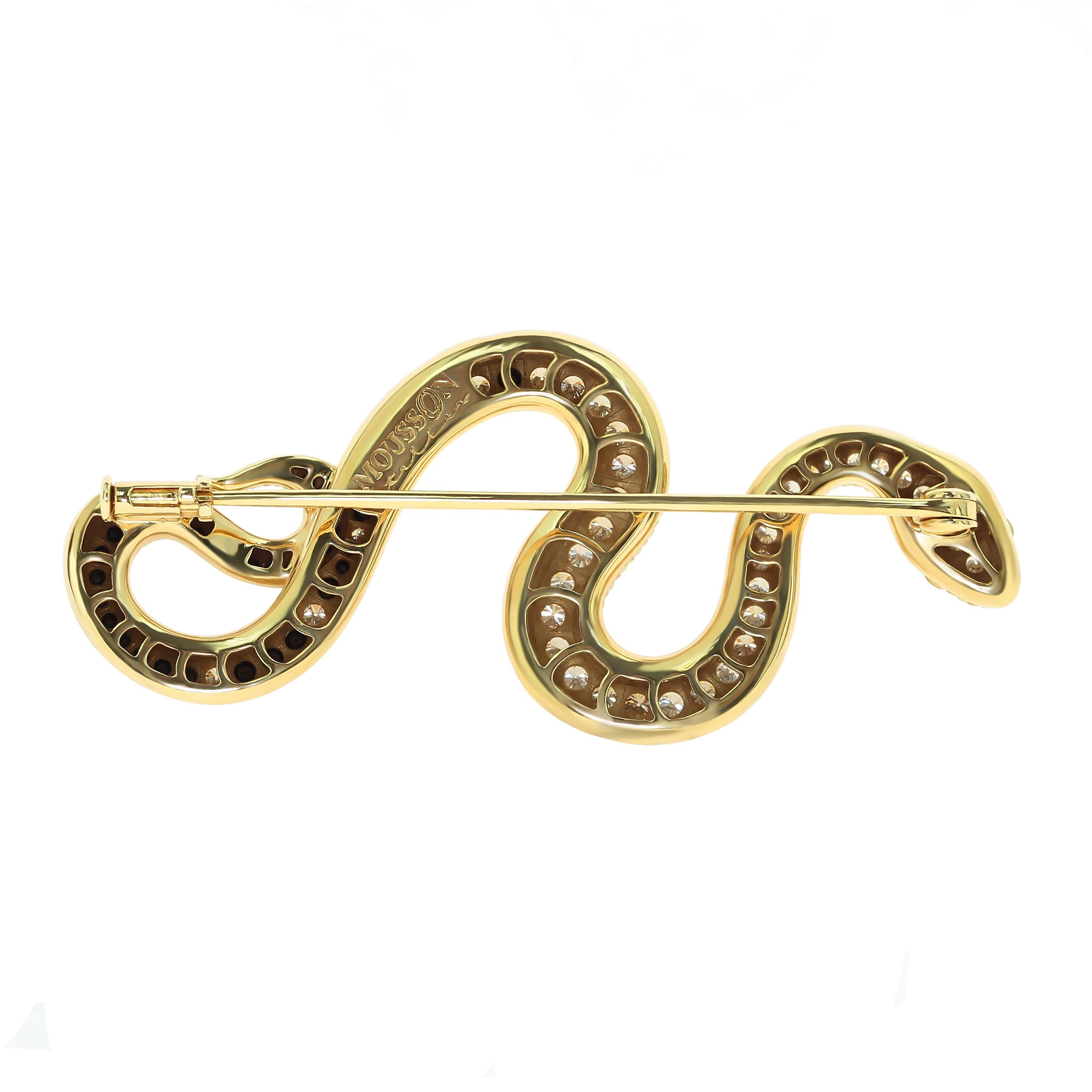 White, Champagne and Black Diamonds 18 Karat Yellow Gold Snake Brooch
The Snake is the first to be met by the Little Prince from St. Exupery's 