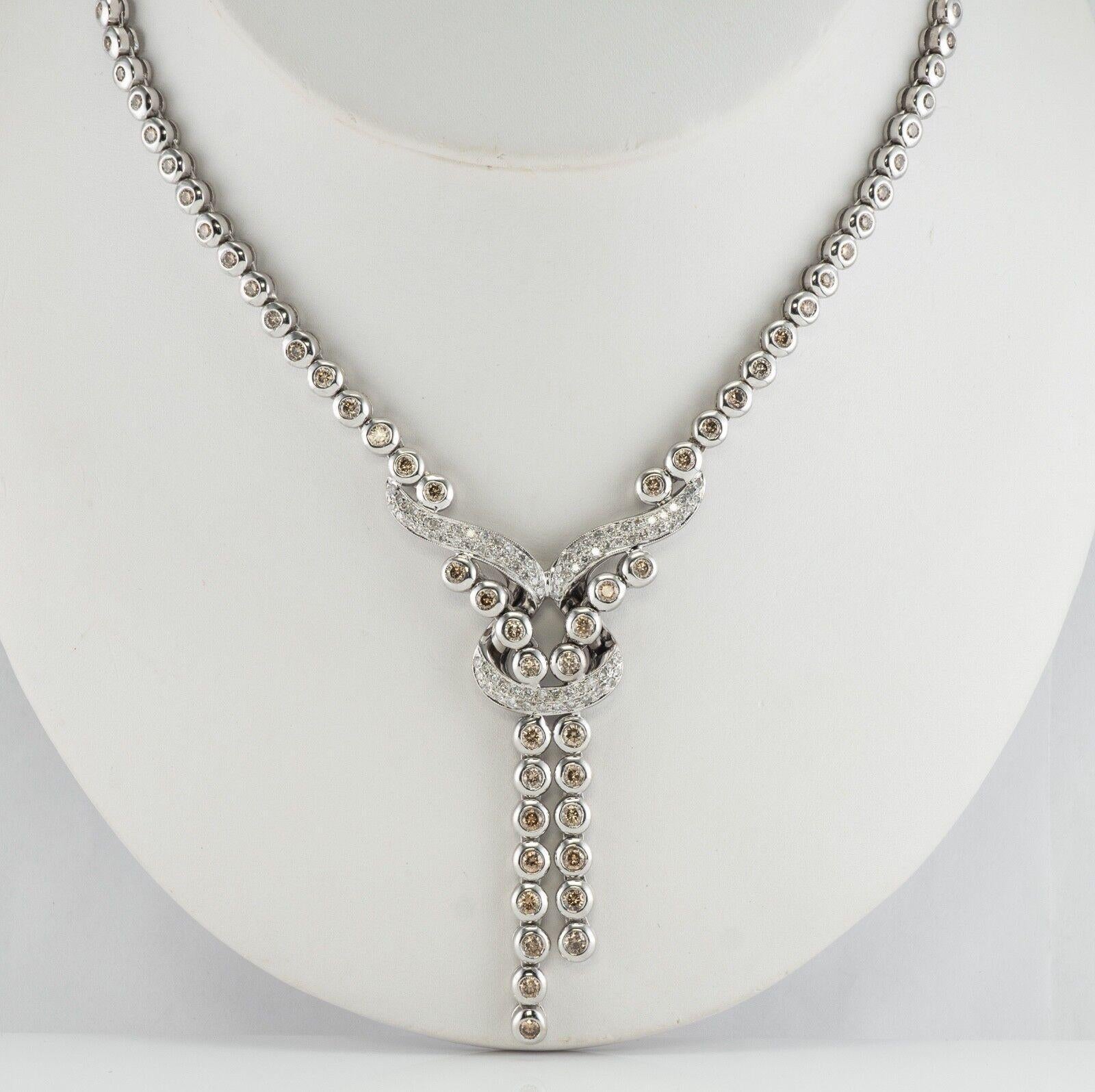 White & Champagne Diamond Necklace 18K Gold 3.84 TDW

We were so lucky to take advantage of a jewelry store close out, and I am so happy to offer this gorgeous necklace for the fraction of retail price, which is $7400 (the tag is still
