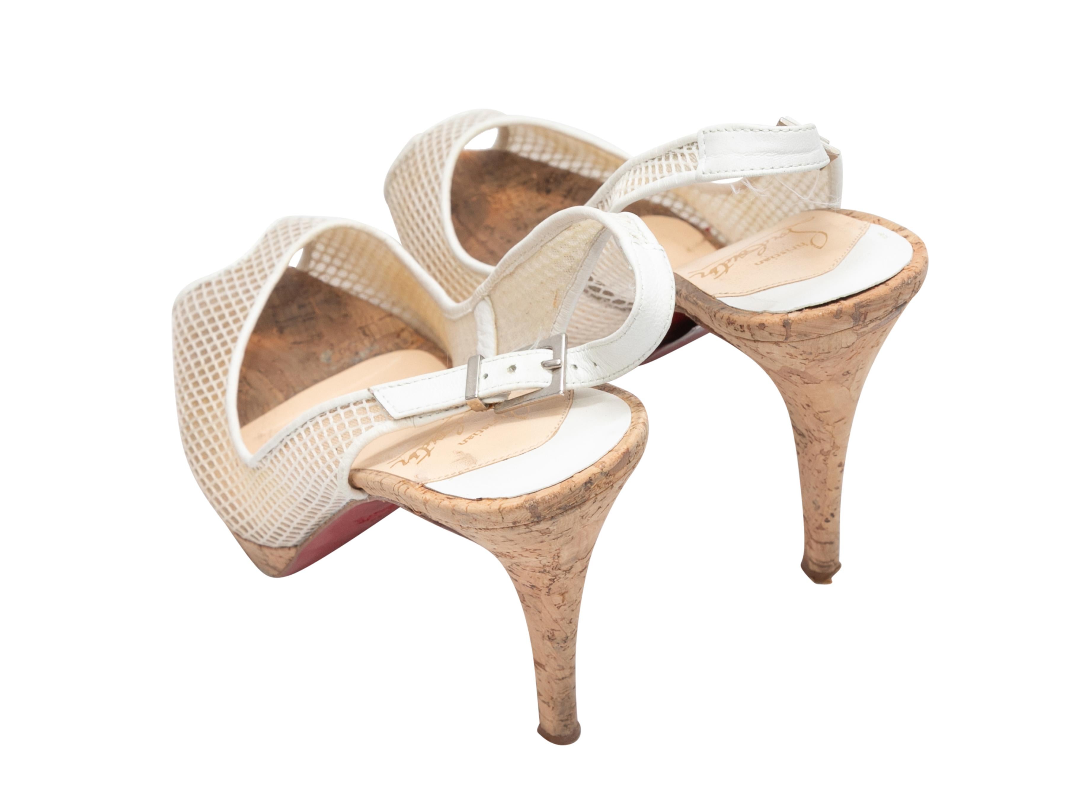 White mesh and cork slingback peep-toe heels by Christian Louboutin. Buckle closures at slingback straps. 4.5