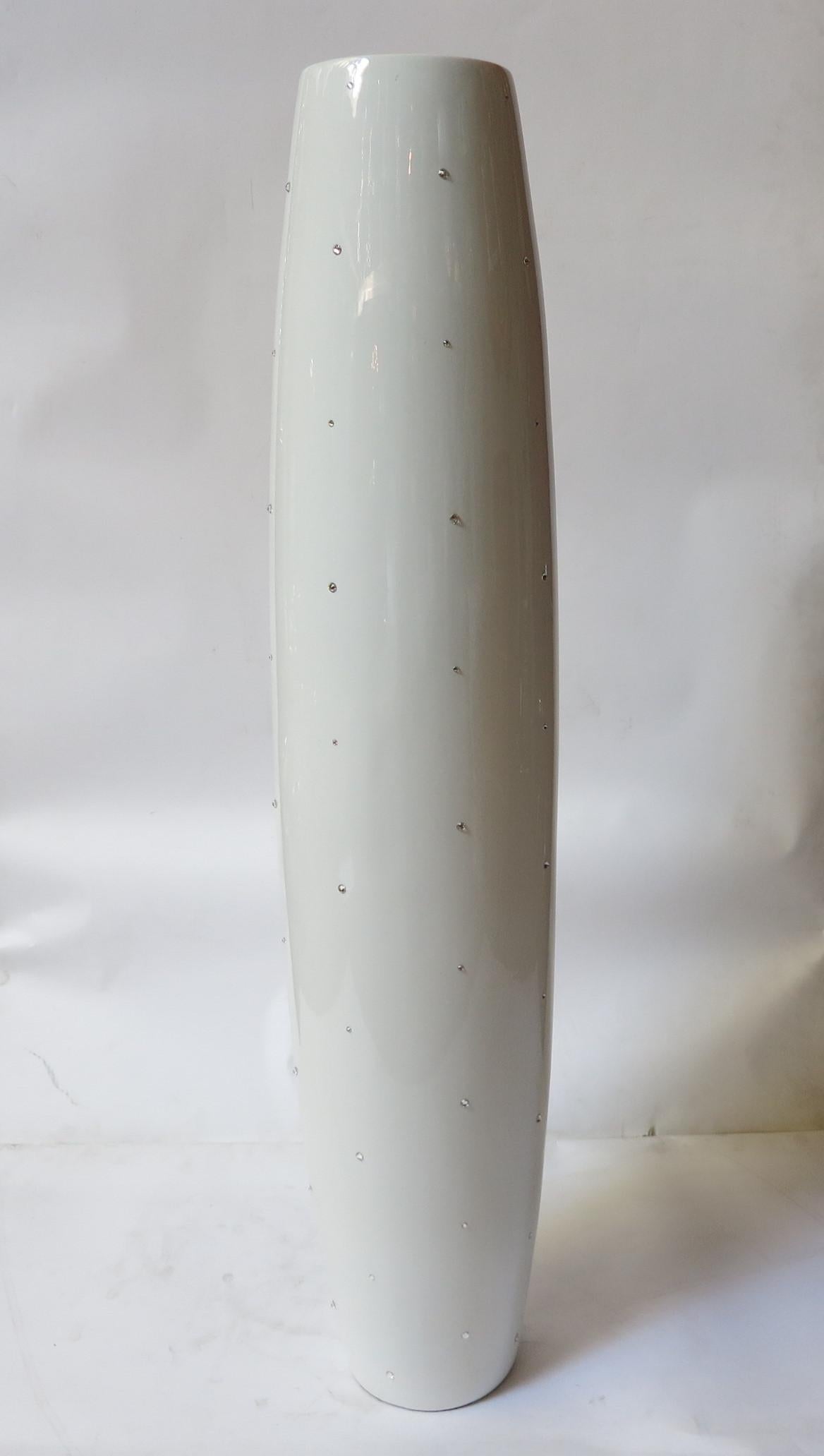 One of a kind white ceramic vase with Swarovski crystals / Designed by Fabio Bergomi / Made in Italy 
Height: 45.5 inches / Diameter: 9 inches 
1 in stock in Palm Springs currently ON FINAL CLEARANCE SALE for $999!!! 
This piece makes for a great