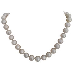 White Color South Sea Pearls Round Shape, 18 Karat Gold Clasp