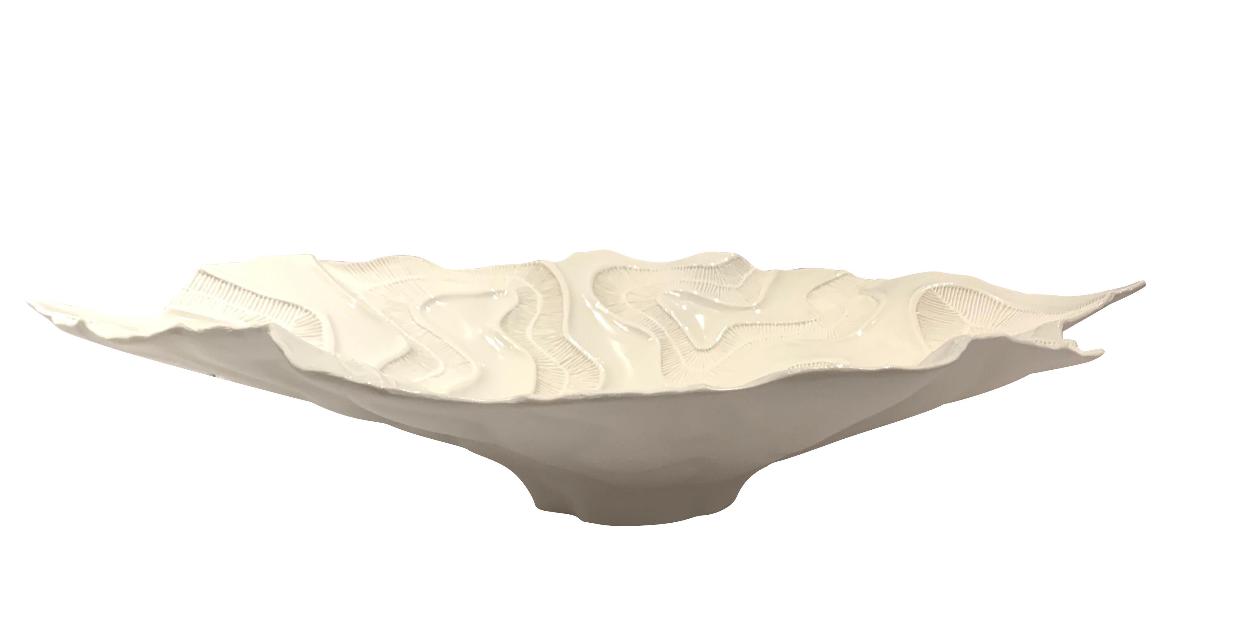 Contemporary Italian white porcelain bowl with decorative white coral motif details.
Organic free form shape.
Also available in white with gold details (S5788), and white with platinum details (S5792)
ARRIVAL TBD.