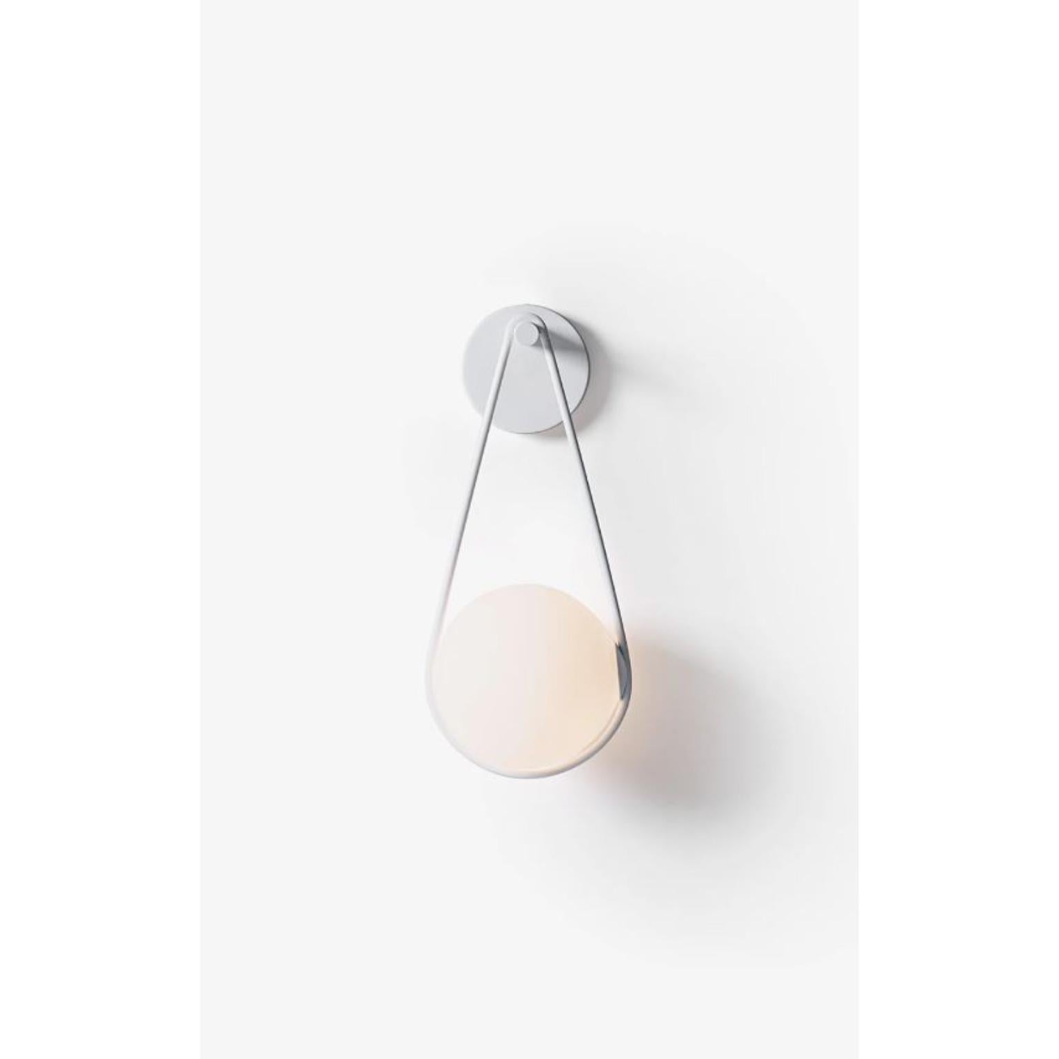 White Corda Wall Lamp by Wentz
Dimensions: D 22 x W 22 x H 55 cm
Materials: Aluminum, Blown Glass.


WEIGHT: 1,2kg / 2,6 lbs
Colors: Black, White
LIGHT SOURCE: Built-in LED. 150lm. 2700K. 80 CRI.
DIMMING ELV @ 120VAC.
VOLTAGE: 120-277V -