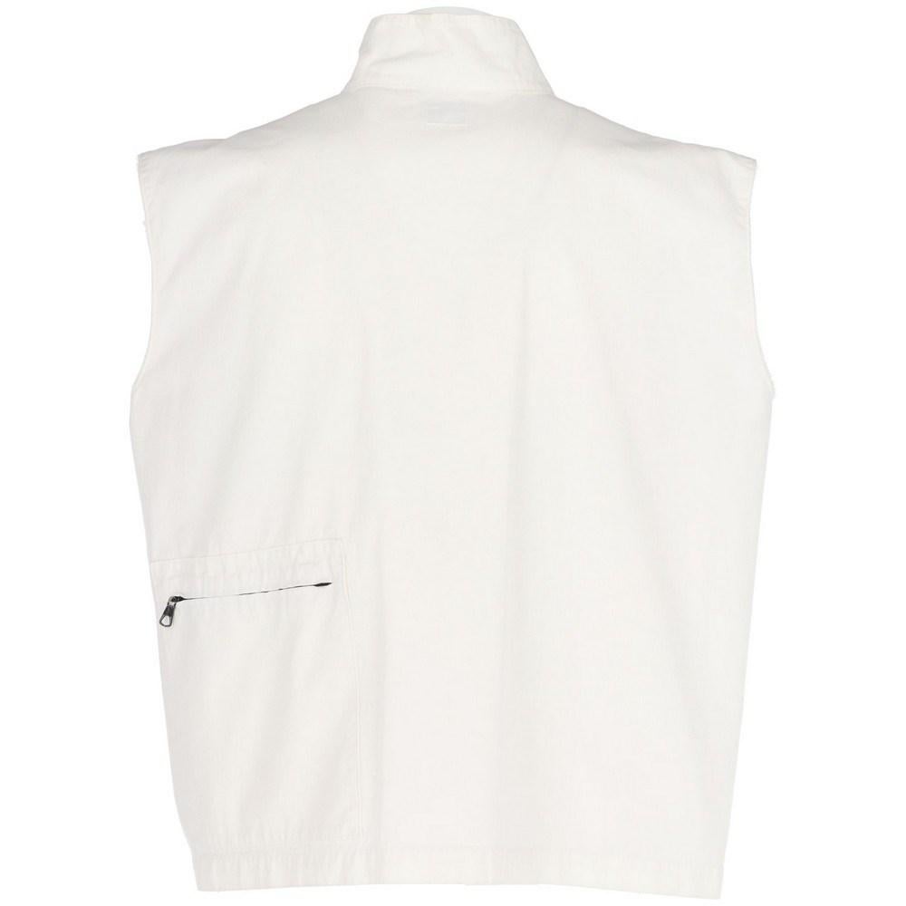 White cotton C.P.Company 90s vest with mandarin collar and velcro strap fastening. Front black zip closure, one zipped front pocket and a rear one.

Size: S-M

Flat measurements
Height: 74 cm
Bust: 56 cm

Product code: X5283

Composition: