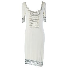 Weißes Baumwollstrickkleid mit silbernen Metallringen von Christian Dior Boutique
