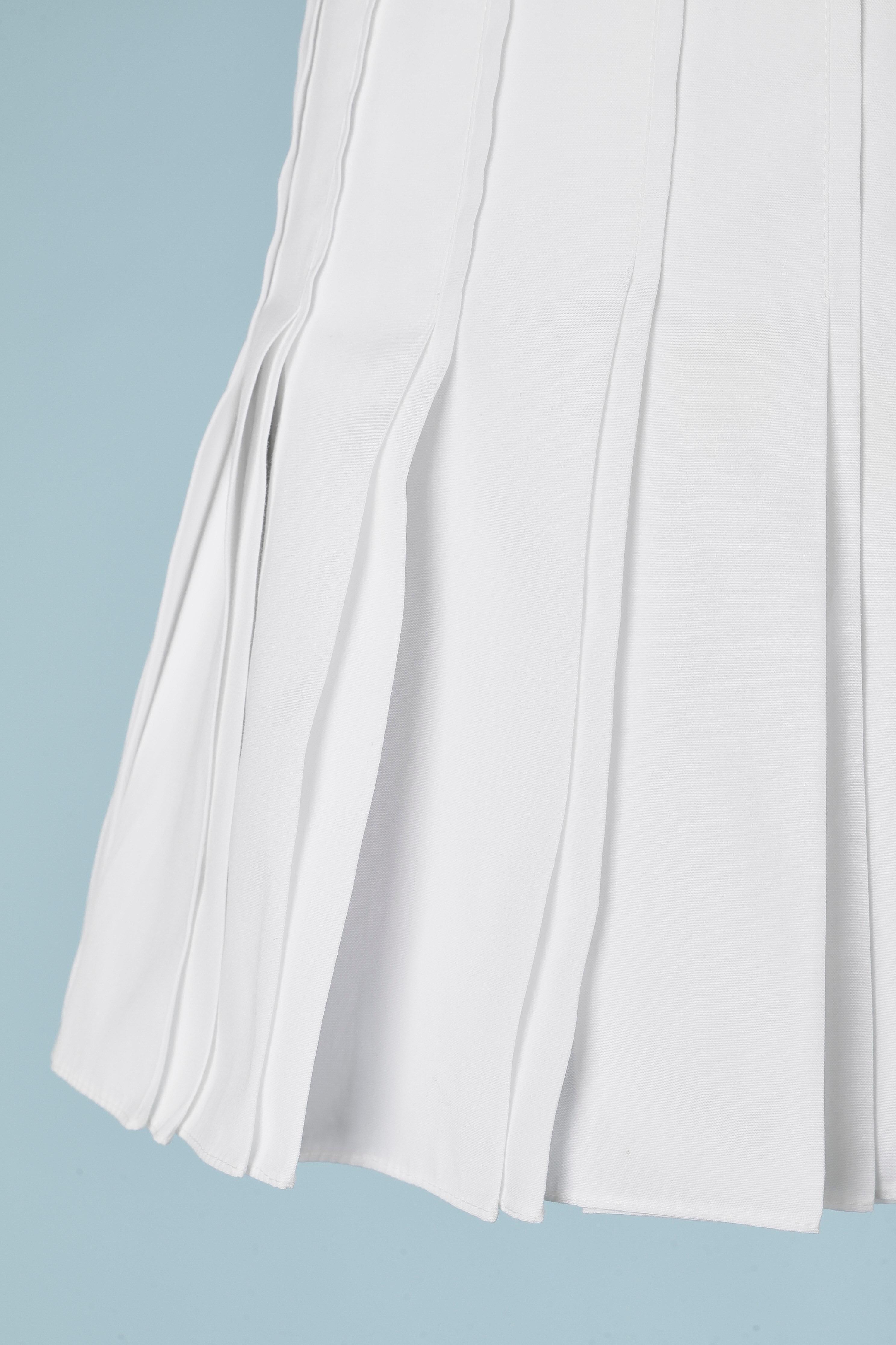 White cotton mini-skirt.
SIZE S